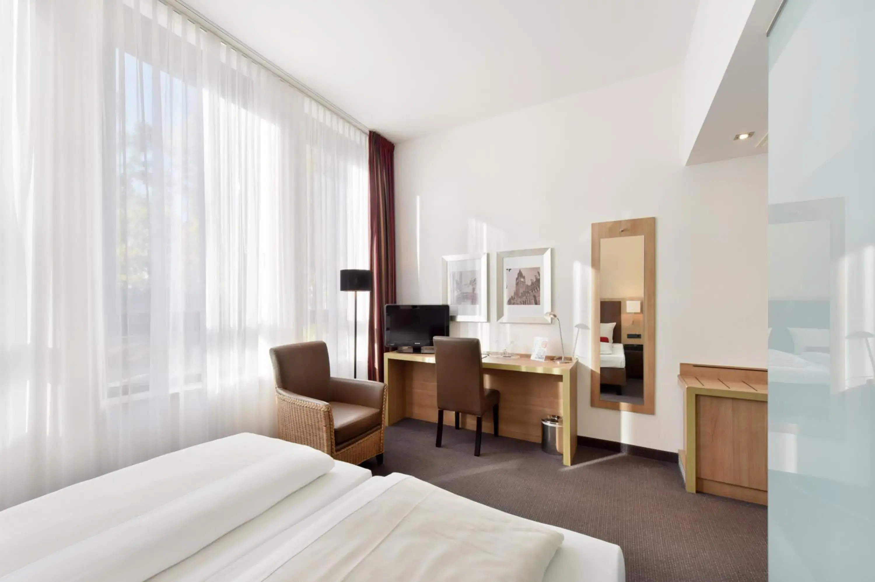 Photo of the whole room, Bed in ACHAT Hotel München Süd Photo of the whole room, Bed in ACHAT Hotel München Süd