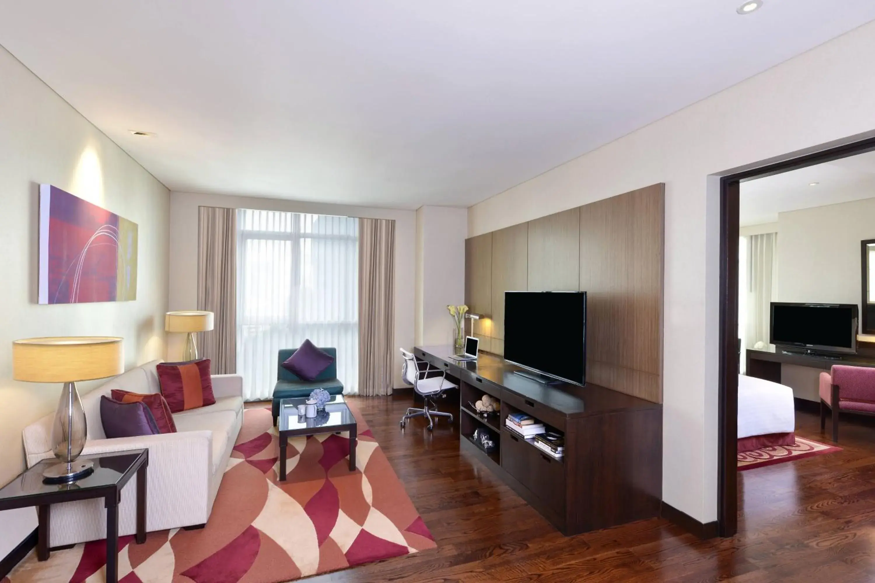 Living room, TV/Entertainment Center in Sathorn Vista, Bangkok - Marriott Executive Apartments