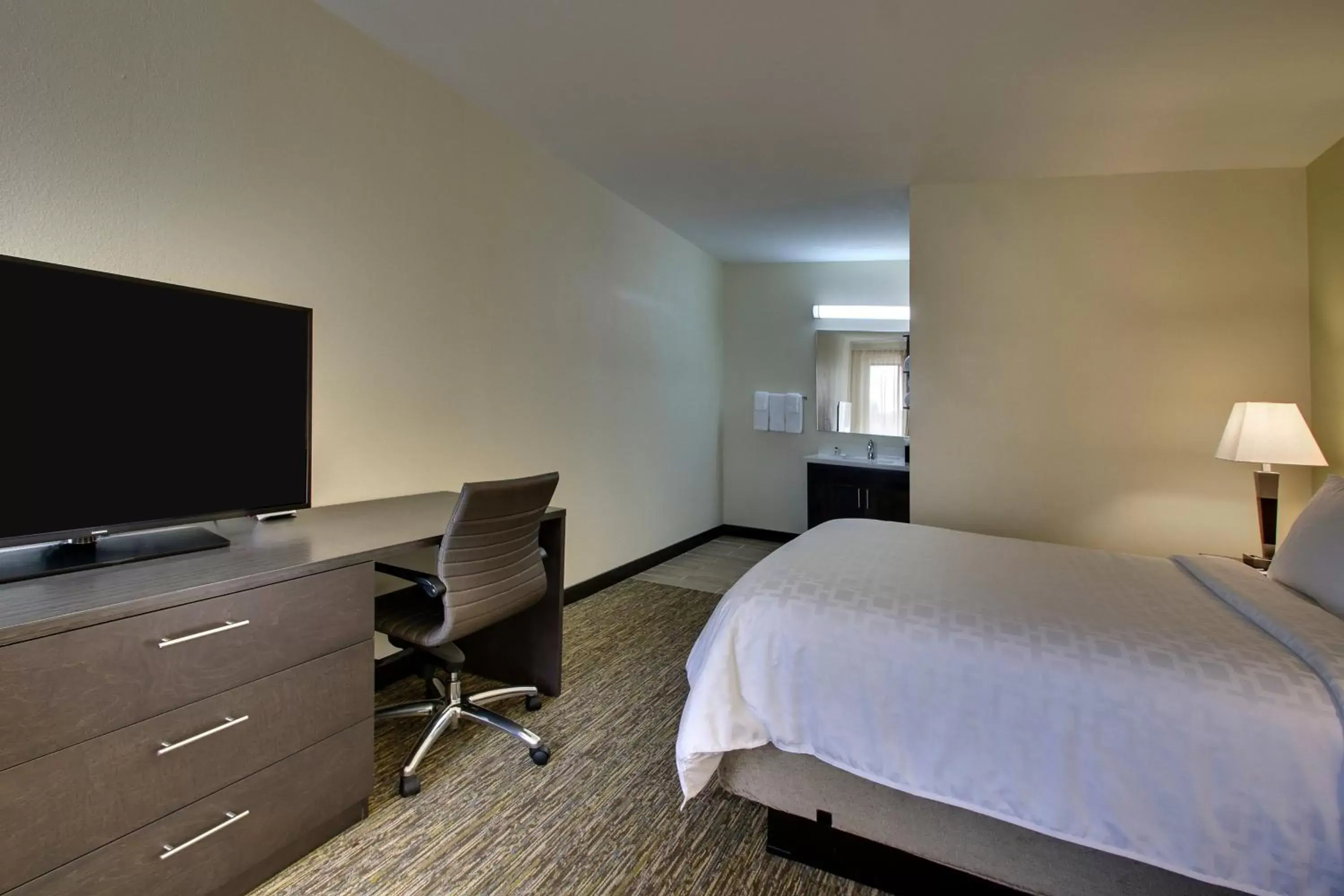 Photo of the whole room, TV/Entertainment Center in Candlewood Suites - Wichita East, an IHG Hotel