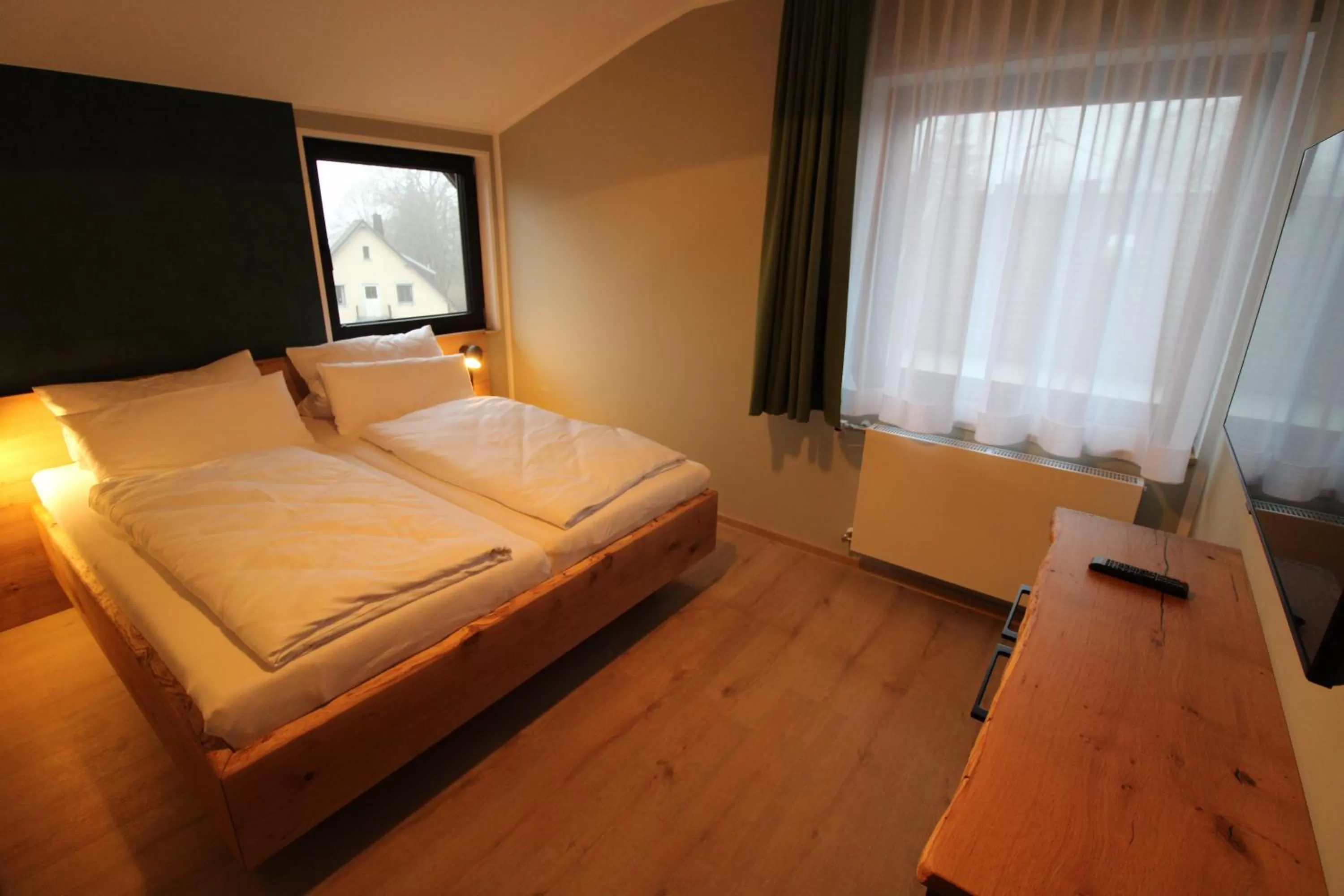 Bed in DER Hirsch Hotel