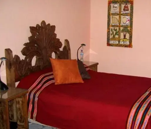 Bed in El Zopilote Mojado