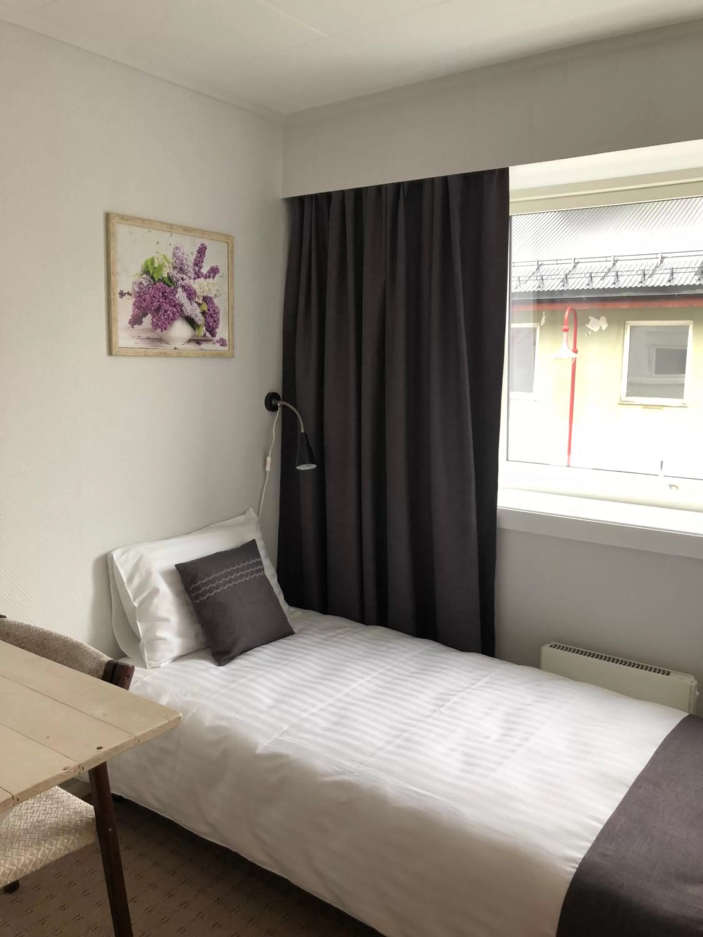 Bed in Arctic Hotel Nordkapp