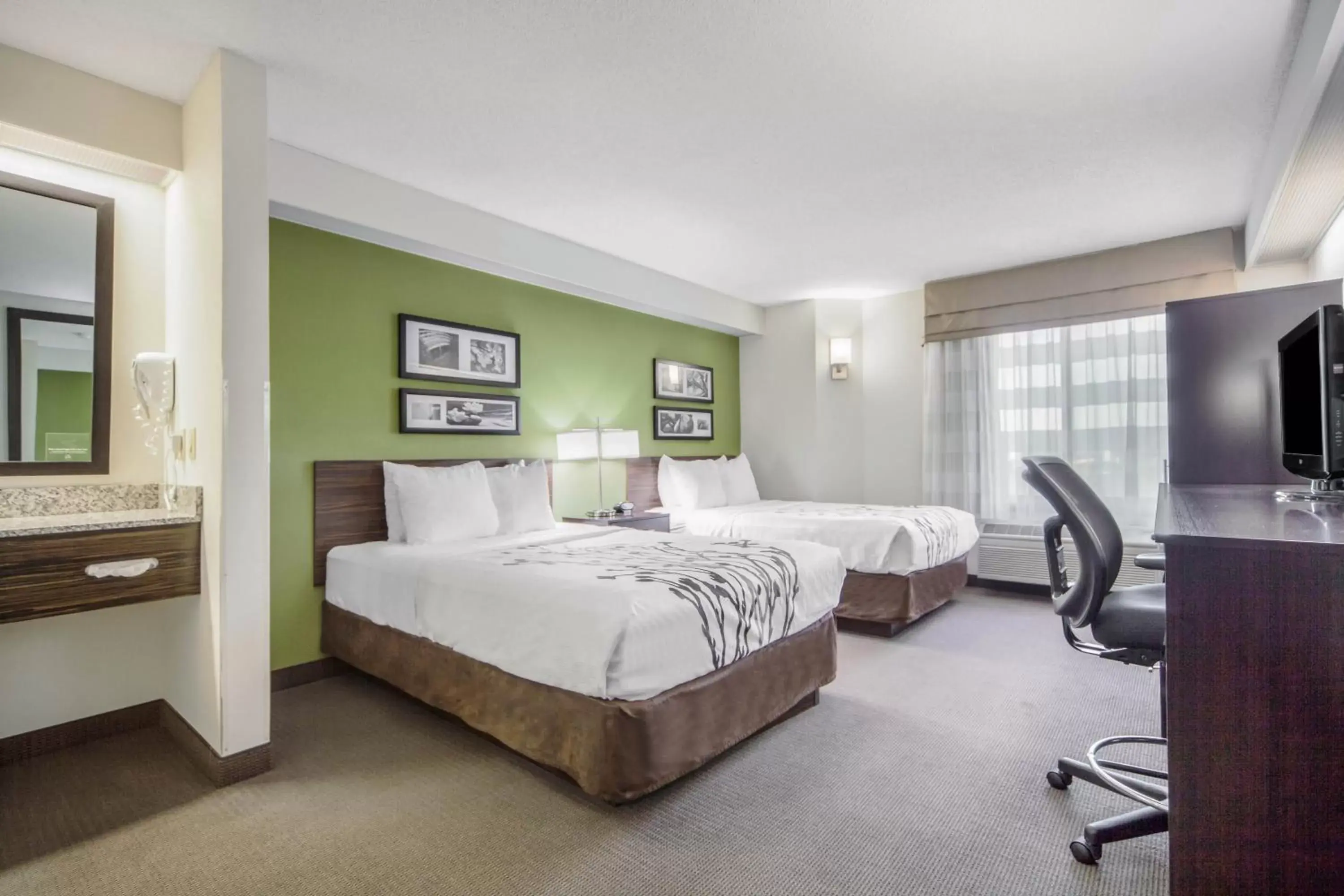 Bed in Sleep Inn & Suites Columbus