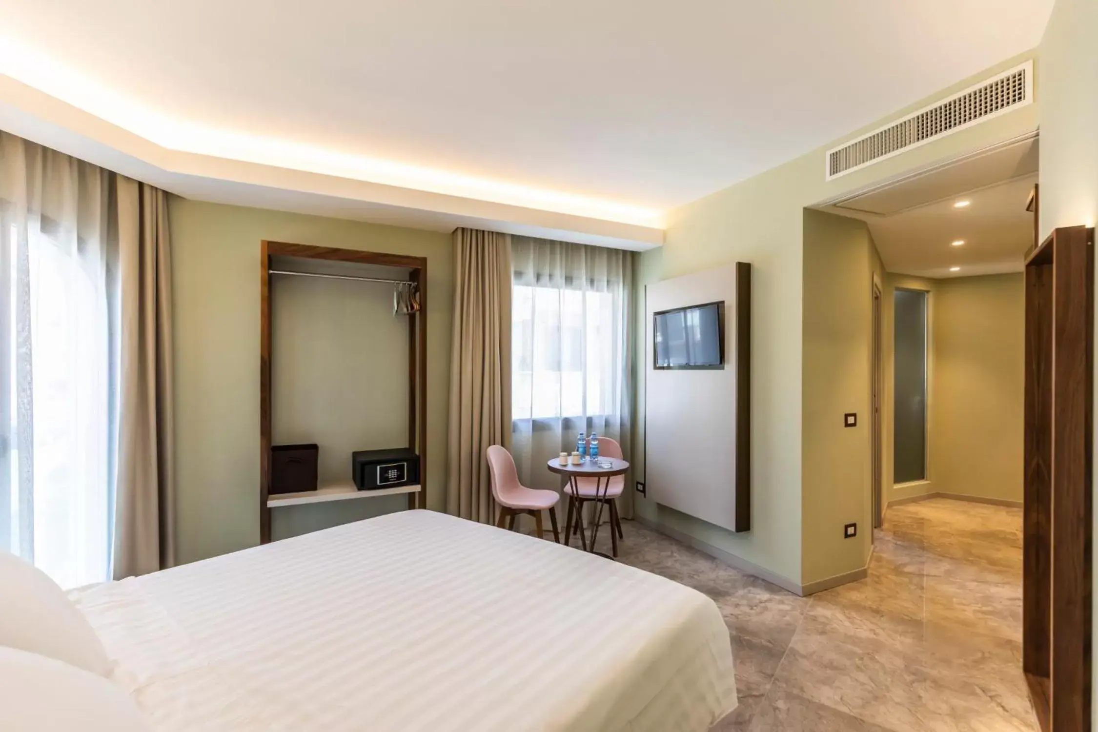 Bed in Solmaris Tropea Rooms & Suites