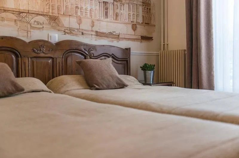 Bed in Familia Hotel