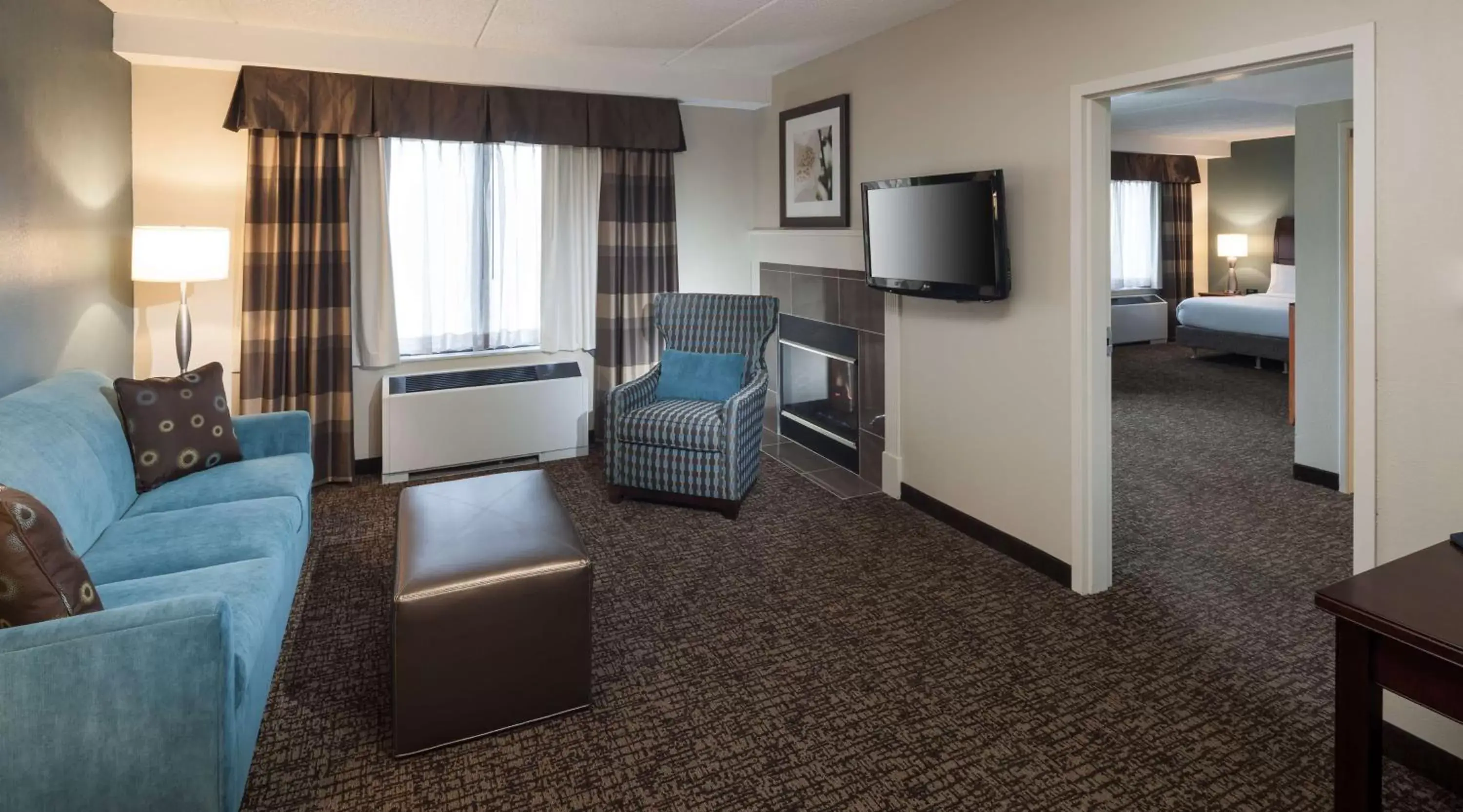 Bed, Seating Area in Hilton Garden Inn Rockaway