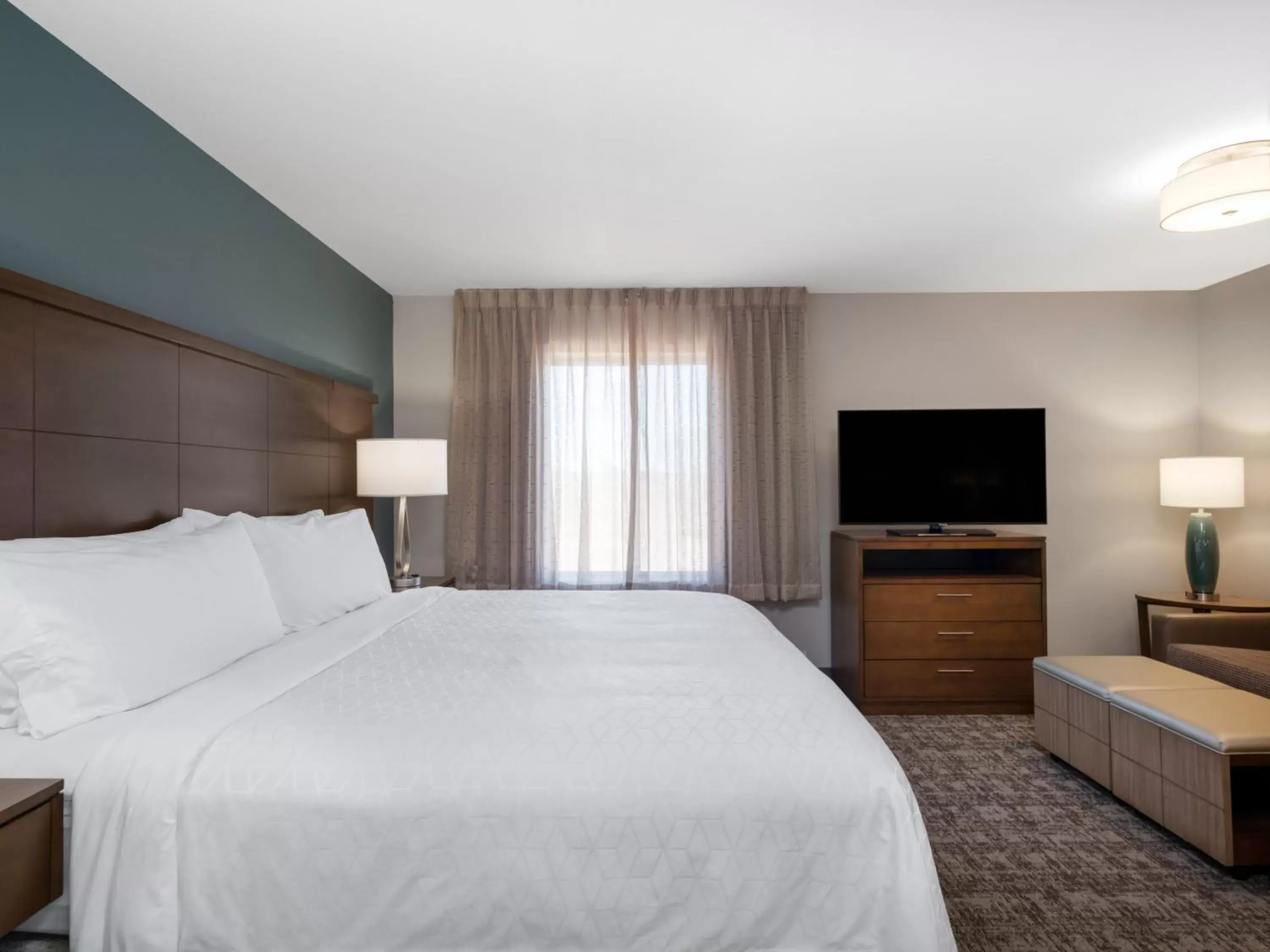 Photo of the whole room, Bed in Staybridge Suites - Sioux City Southeast, an IHG Hotel