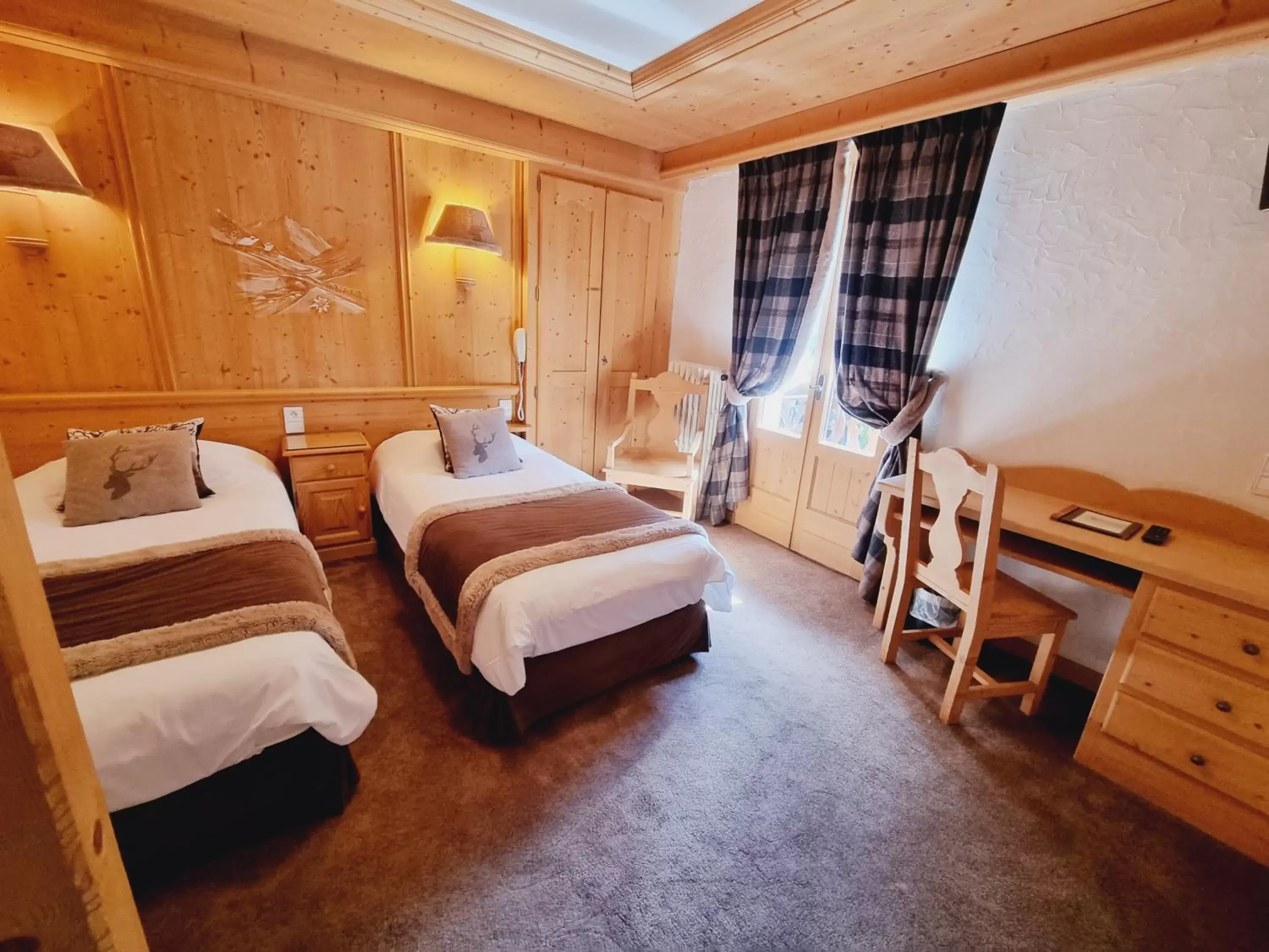 Twin Room in Hôtel Le Sporting Twin Room in Hôtel Le Sporting