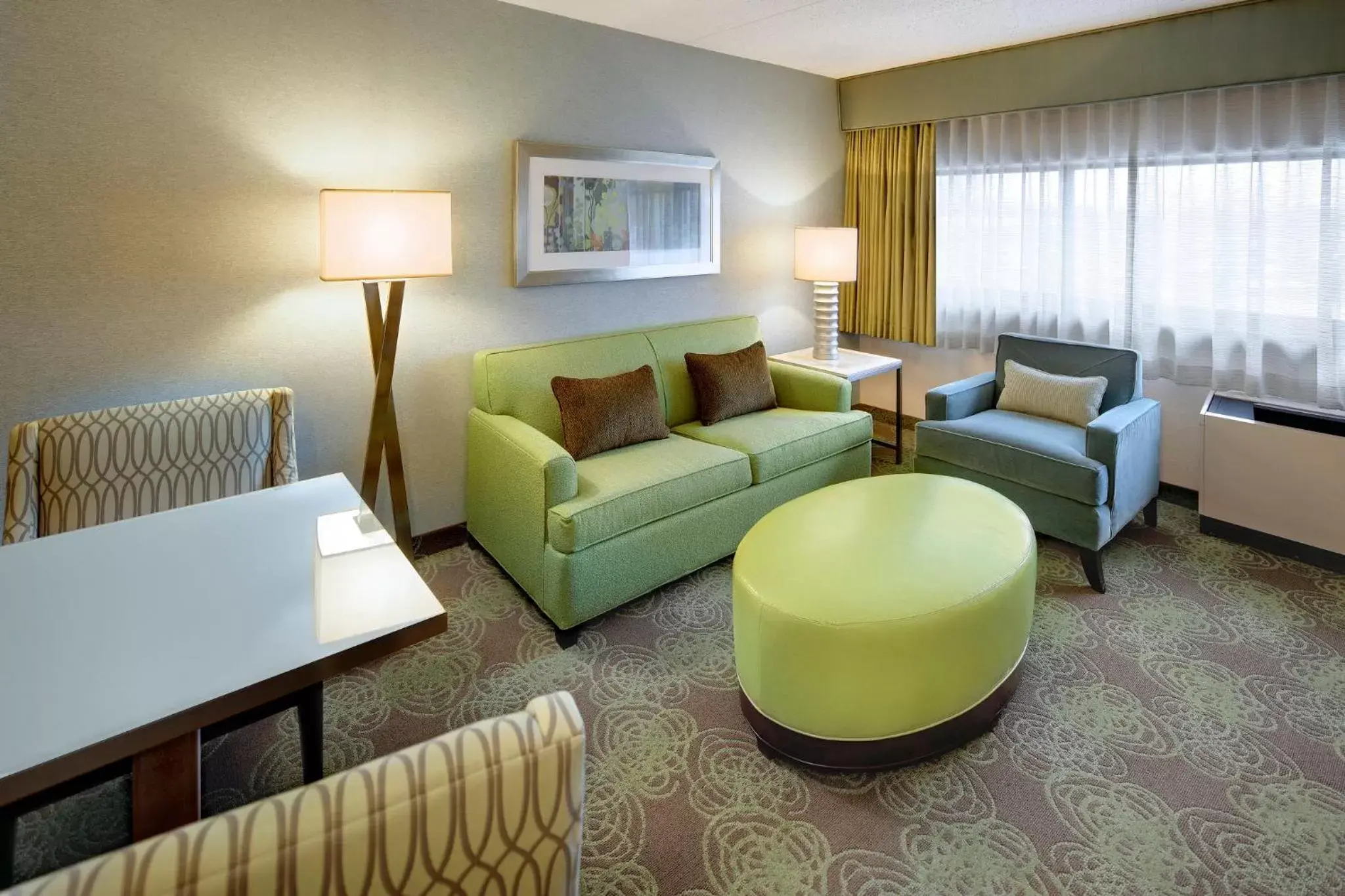 Photo of the whole room, Seating Area in Crowne Plaza Lansing West, an IHG Hotel