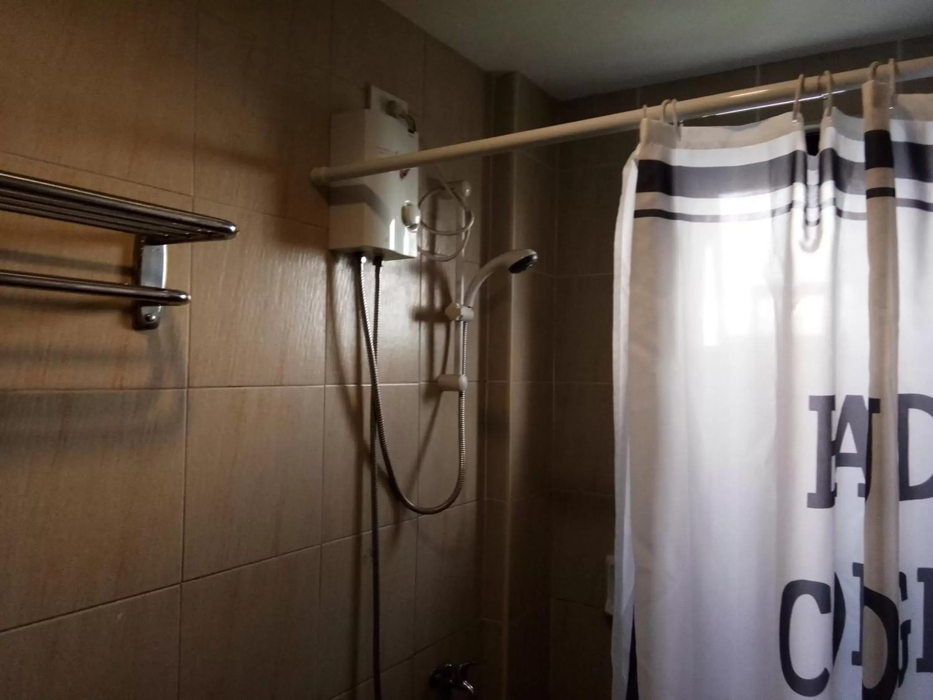 Bathroom in Rangya Hotel