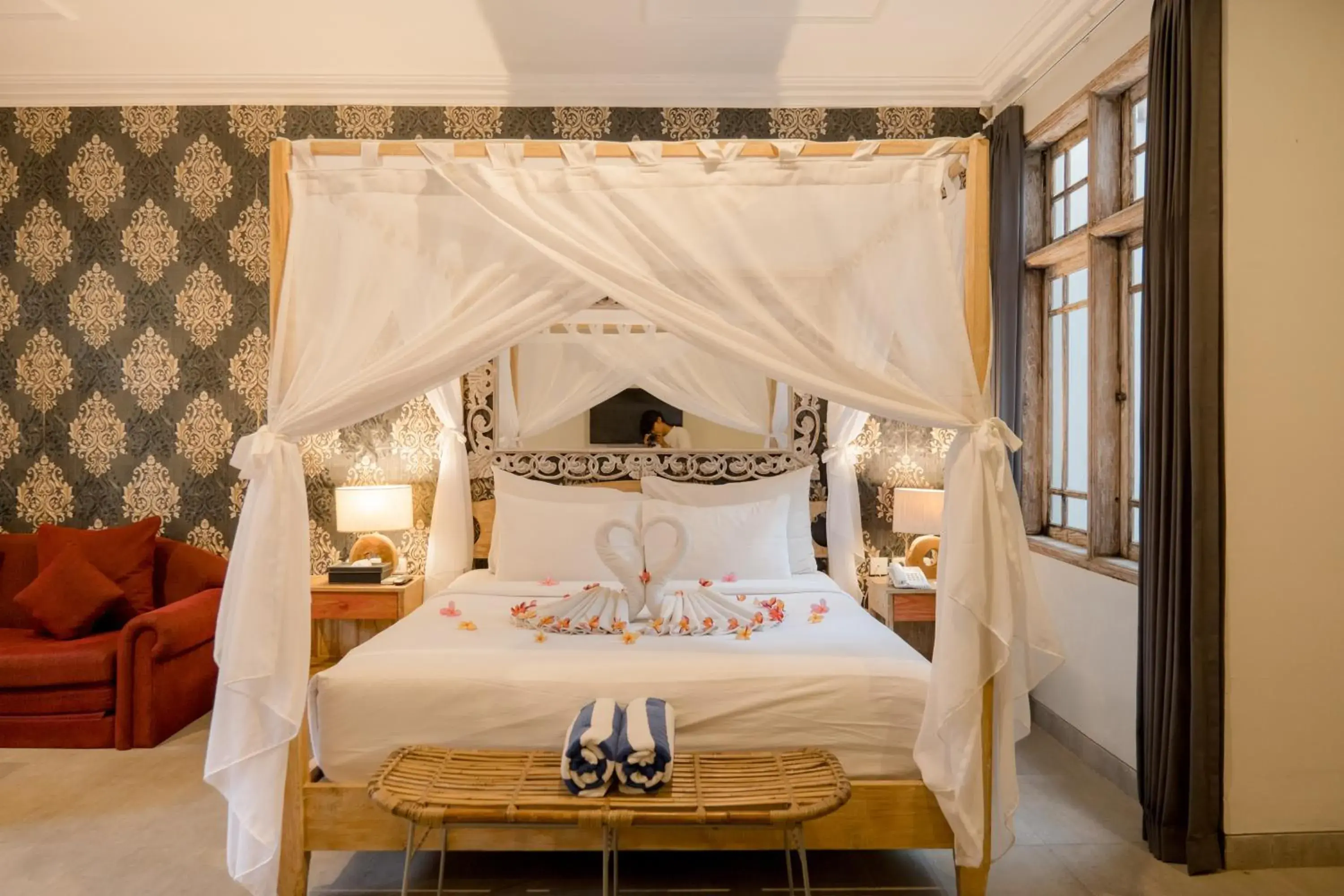 Bed in 18 Suite Villa Loft at Kuta