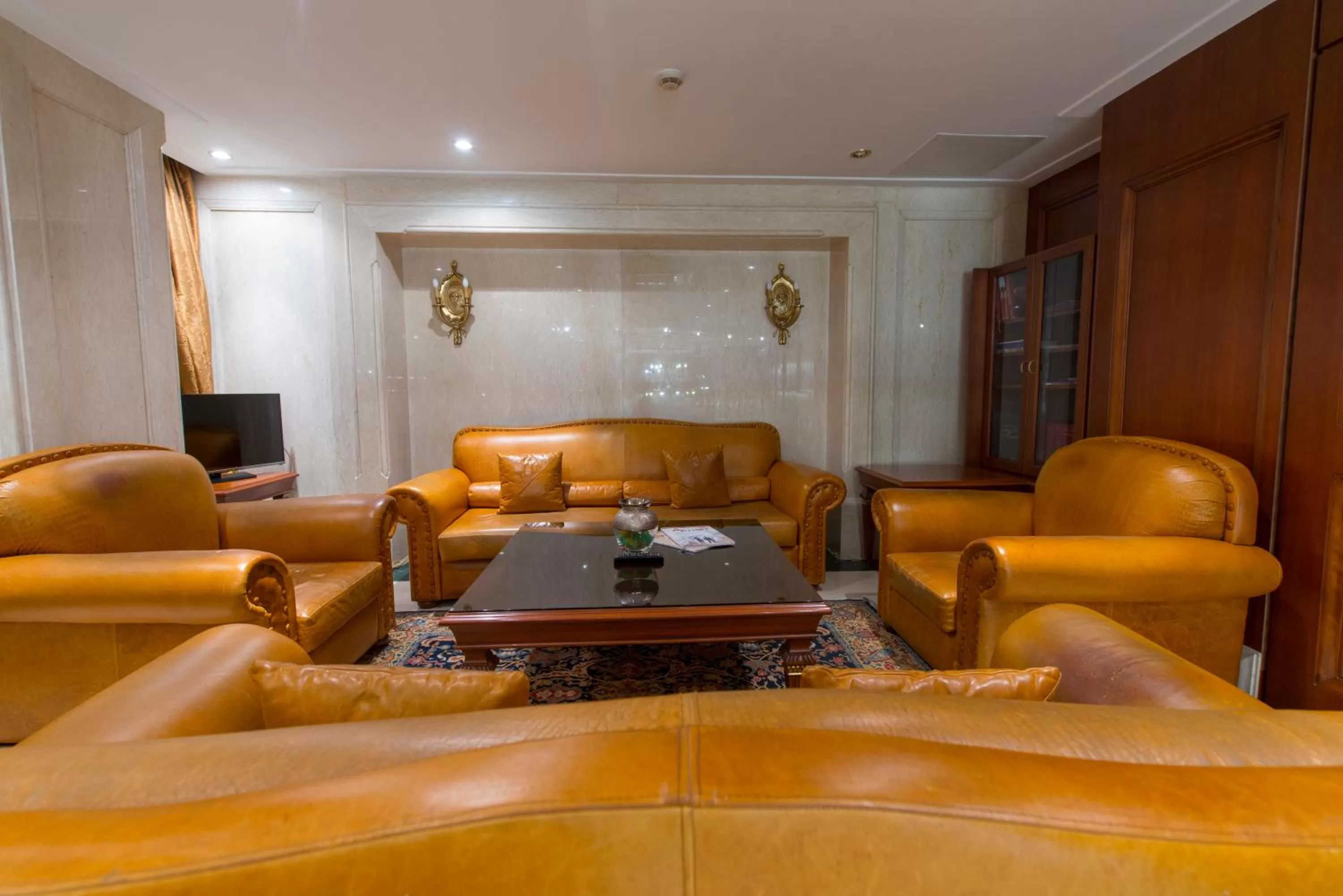 Communal lounge/ TV room in Akar International Hotel