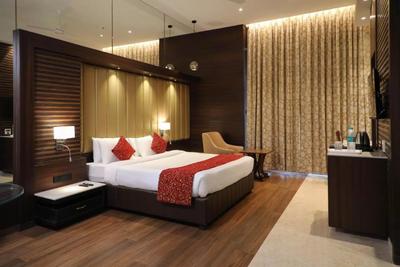 Bed in Hotel Gurudev Grand