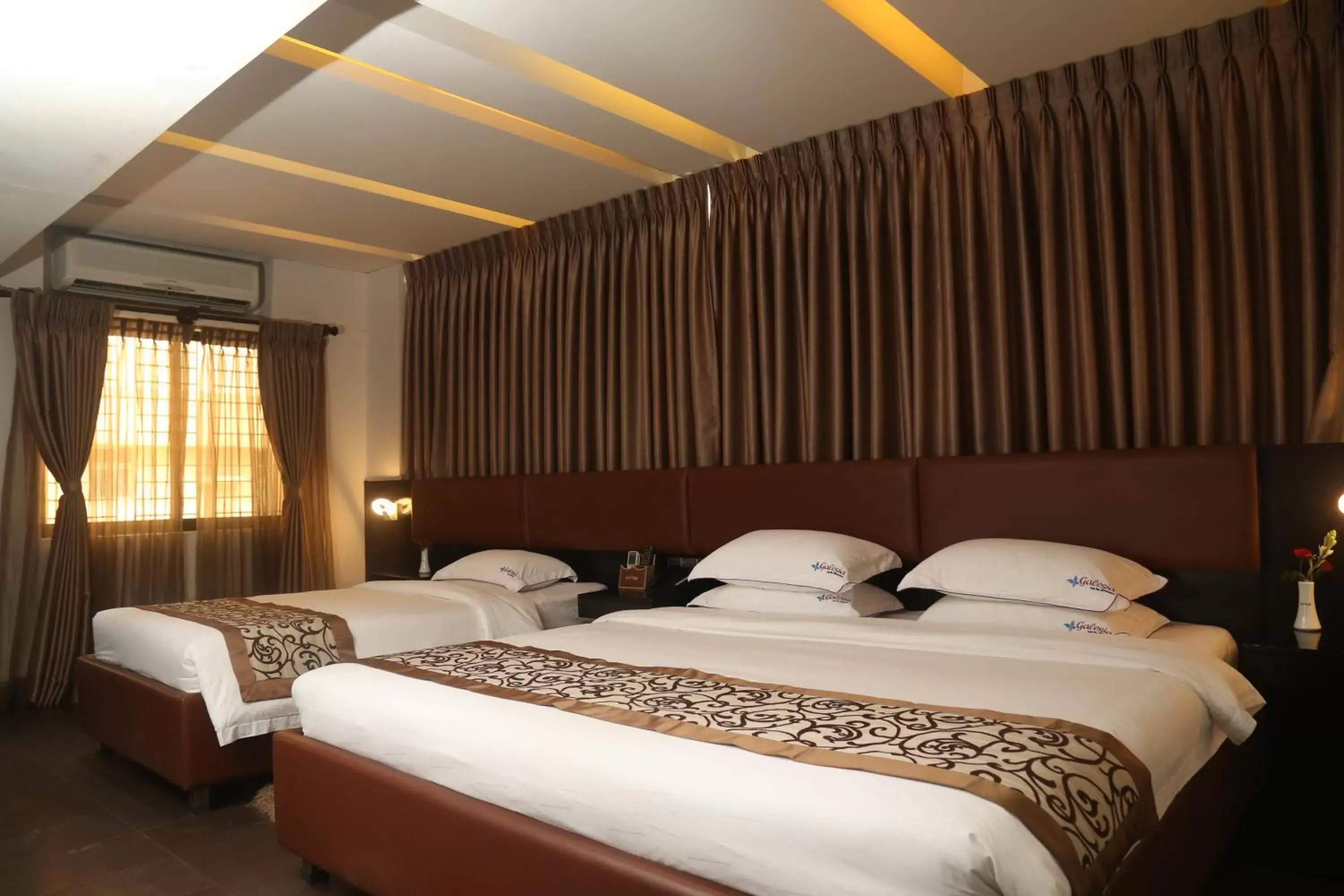 Bed in Galesia Hotel & Resort