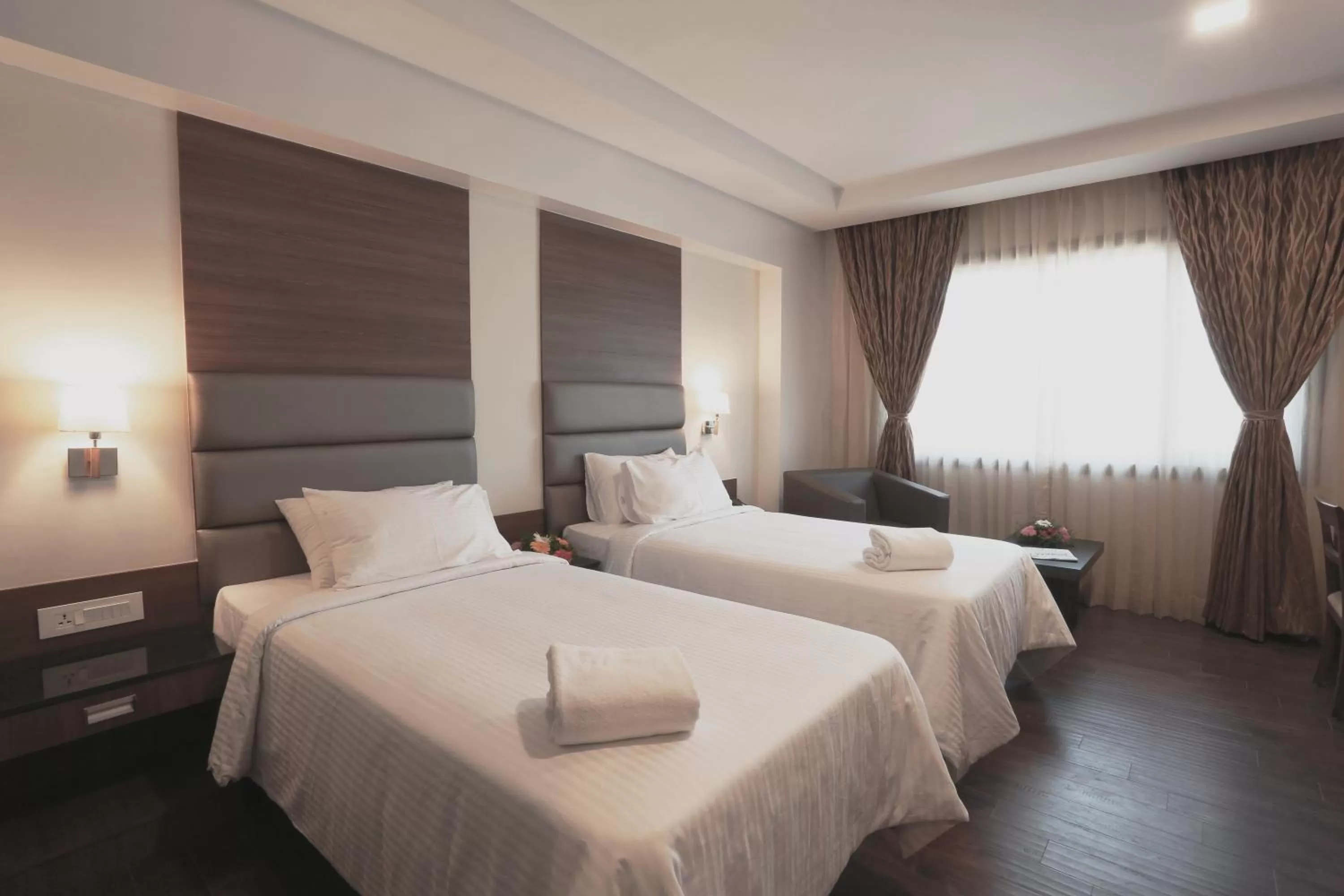 Bed in Fressotel Seetharam