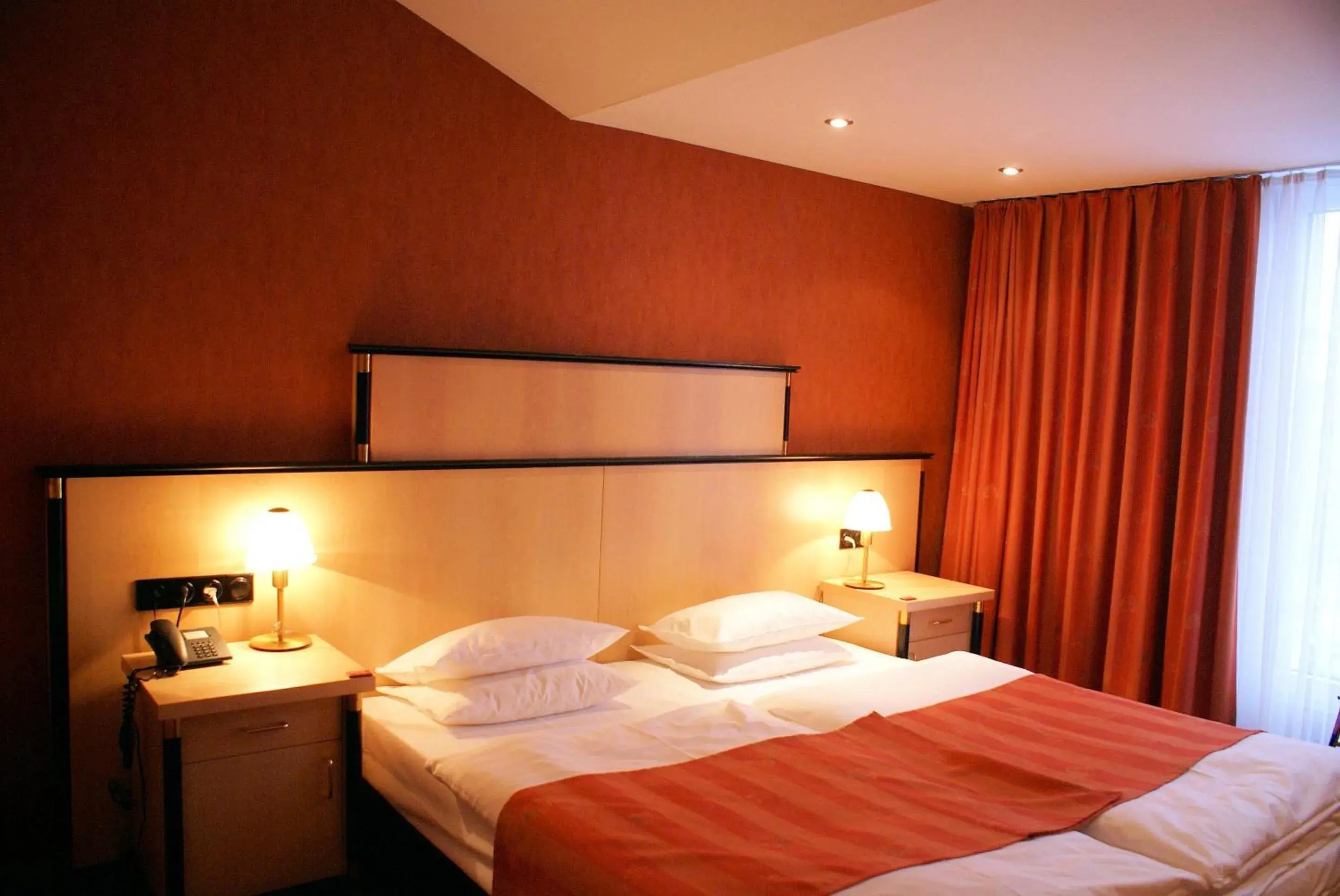 Bed in ARVENA Messe Hotel