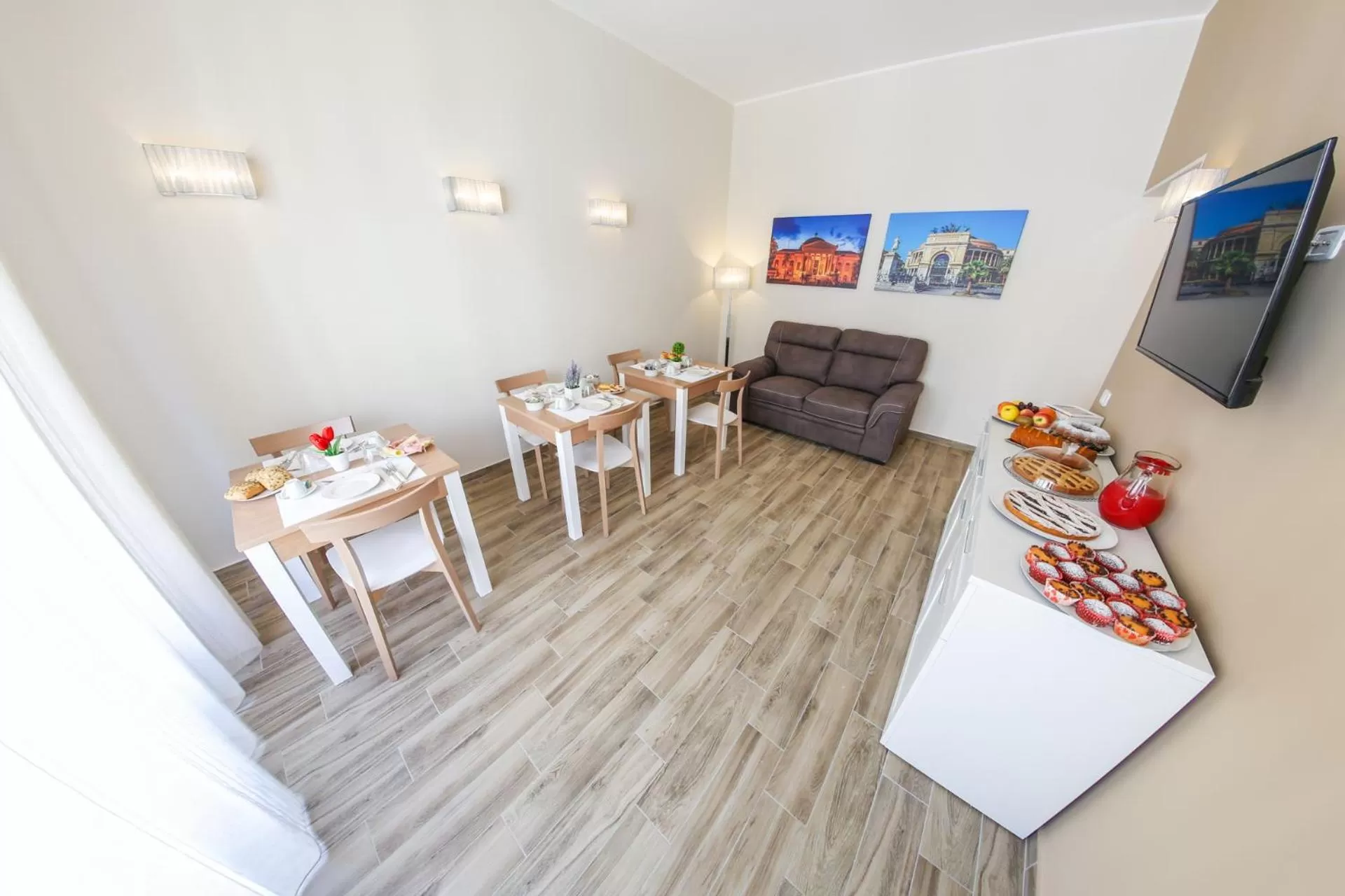 Communal lounge/ TV room in Quinto Stabile Rooms&Suite