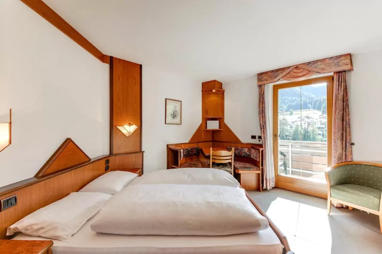 Bedroom, Bed in Smy Koflerhof Wellness & Spa Dolomiti