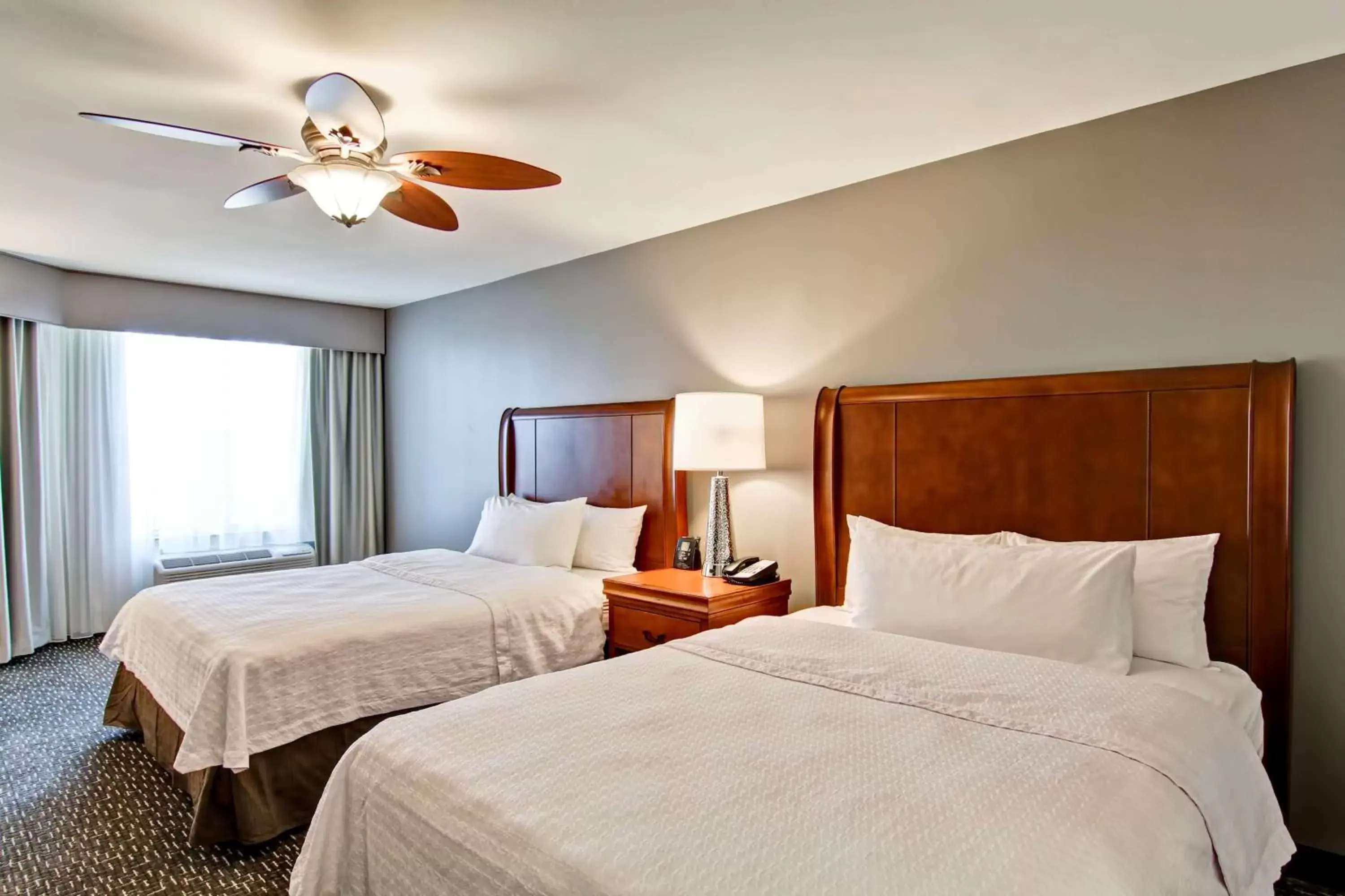 Bed in Homewood Suites by Hilton Bentonville-Rogers