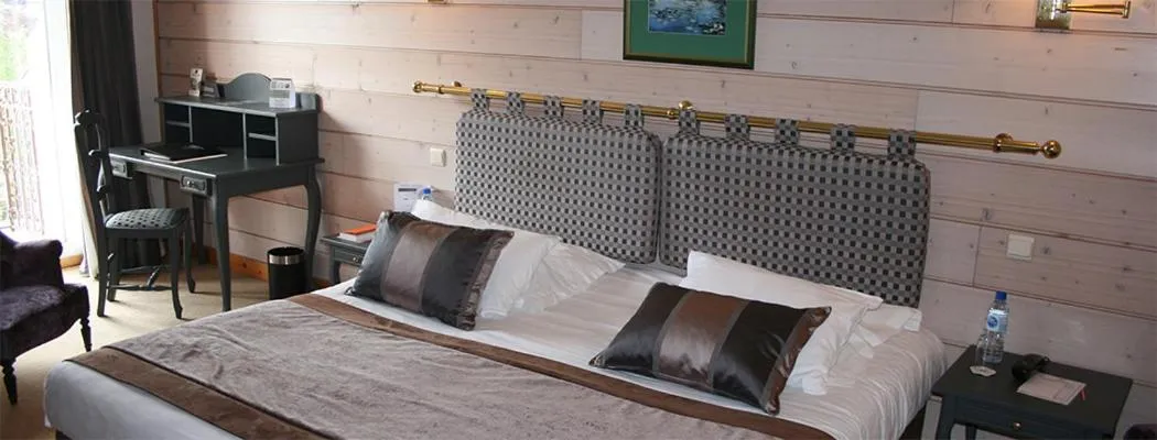 Bed in Le Grand Hotel & Spa