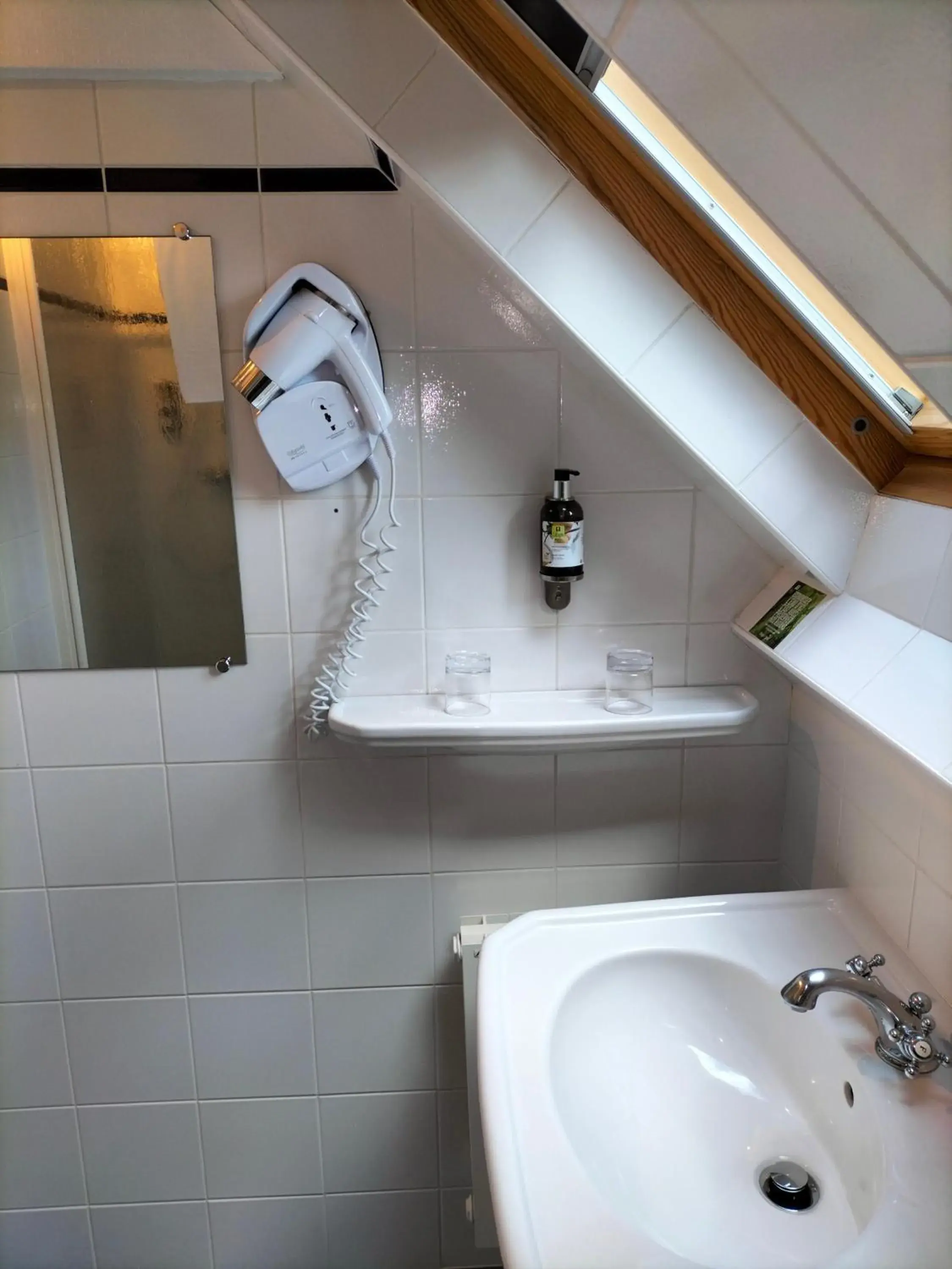 Bathroom in Logis HOTEL RESTAURANT La Regence