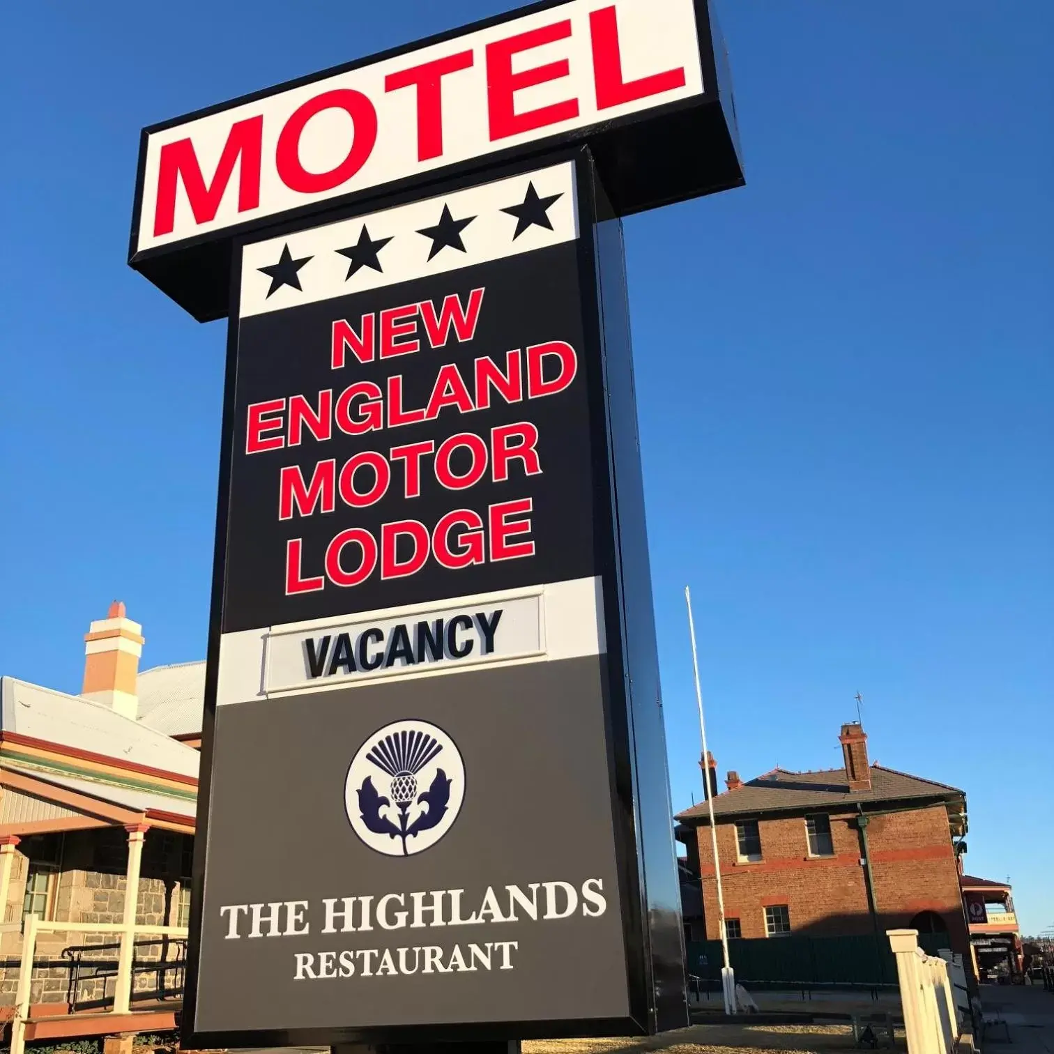 Property logo or sign in New England Motor Lodge