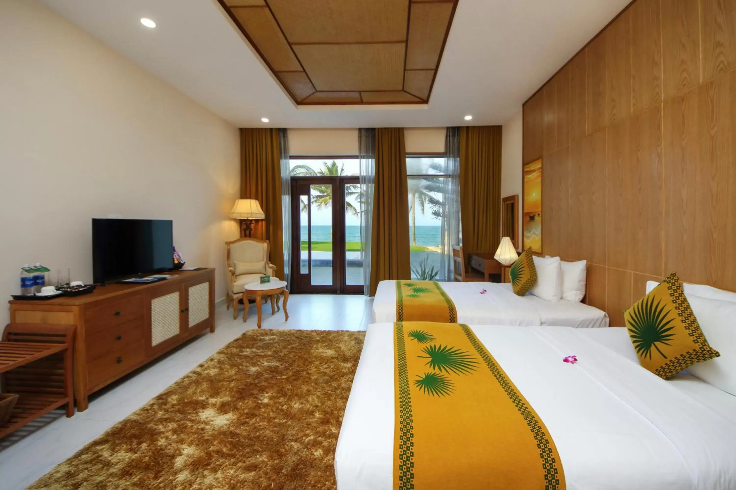 Bedroom in Palm Garden Beach Resort & Spa