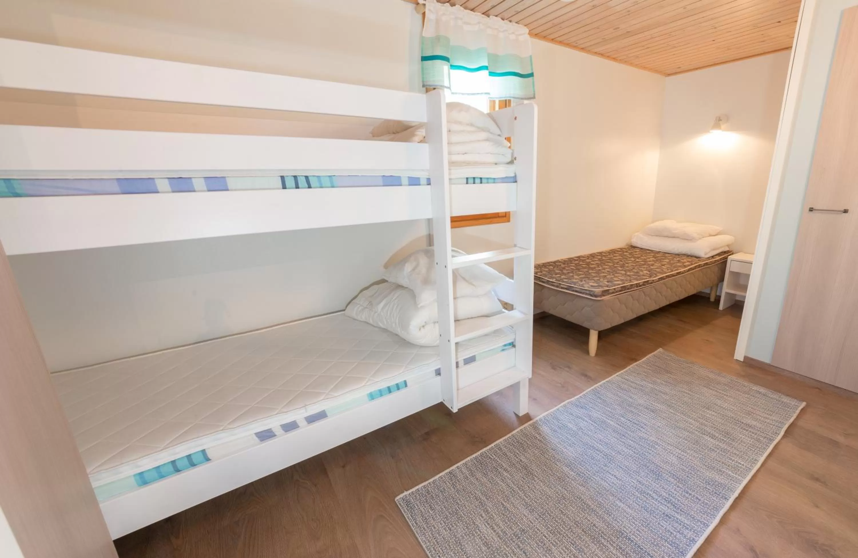 Bedroom, Bed in Yyteri Holiday Cottages