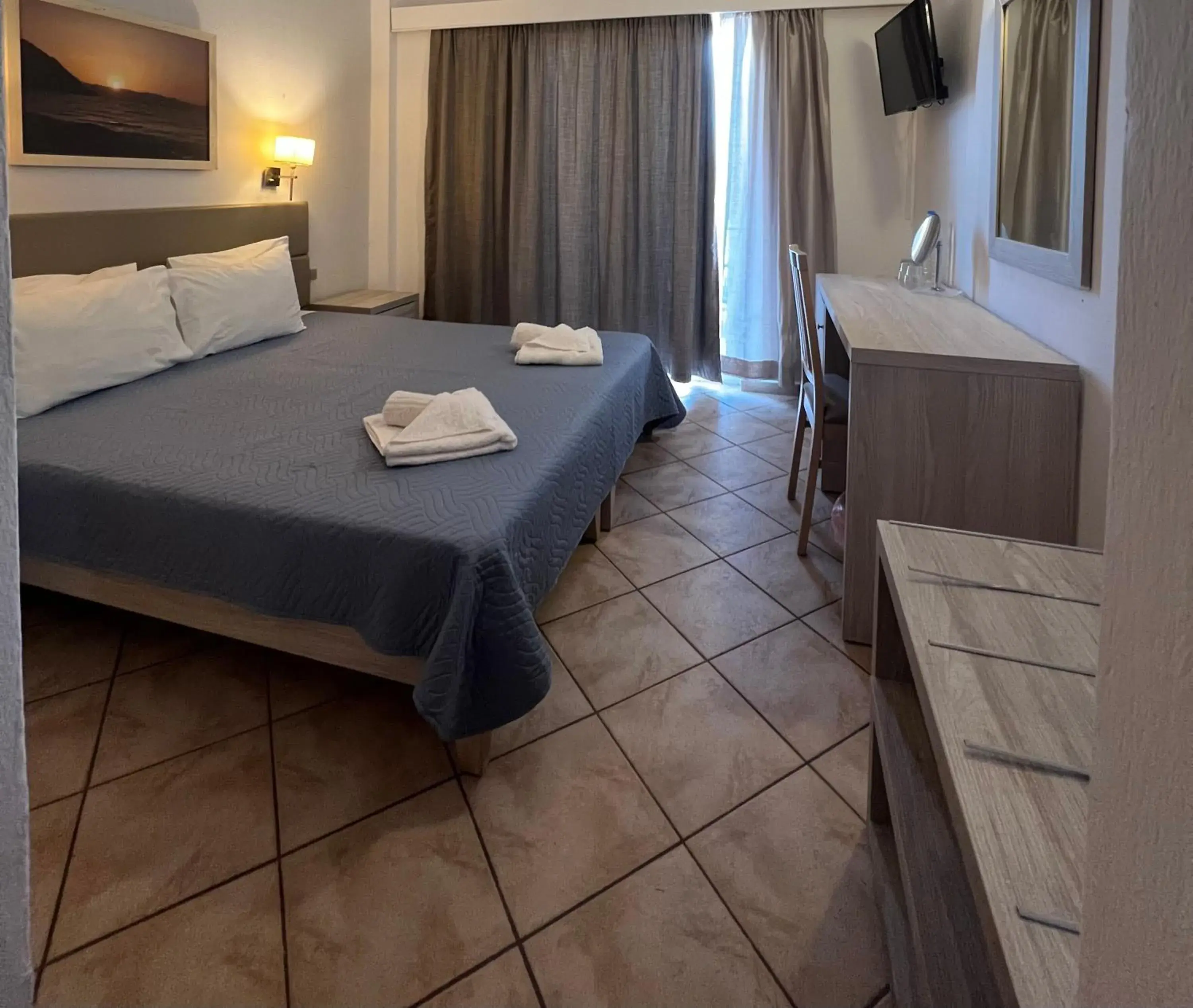 Bed in Aristea Hotel