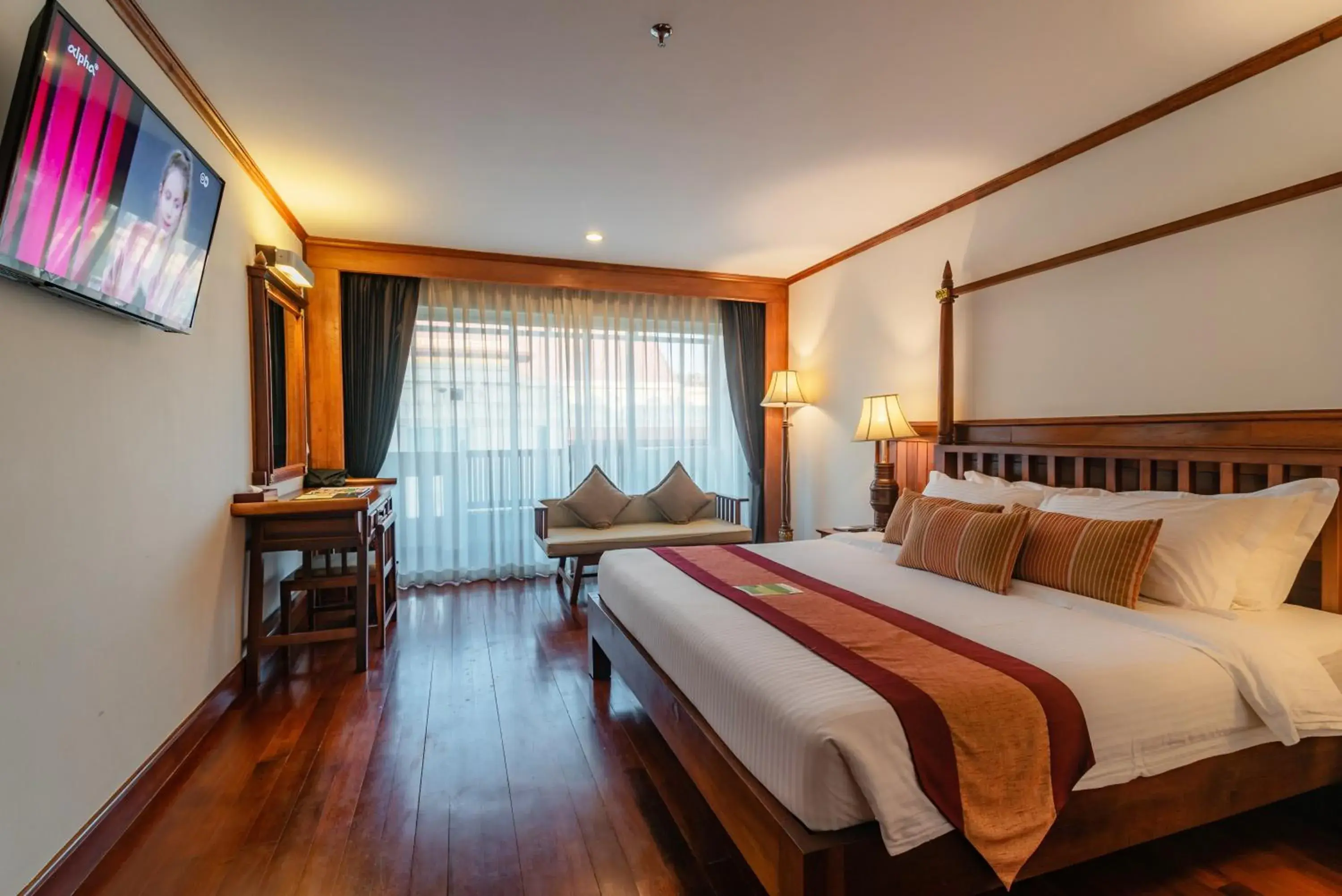 Bed in Empress Residence Resort and Spa