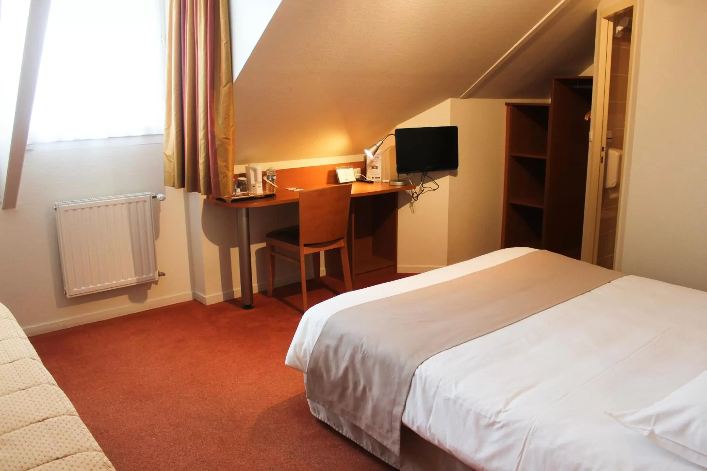 Bedroom, Bed in Kyriad Rennes Nord Hotel