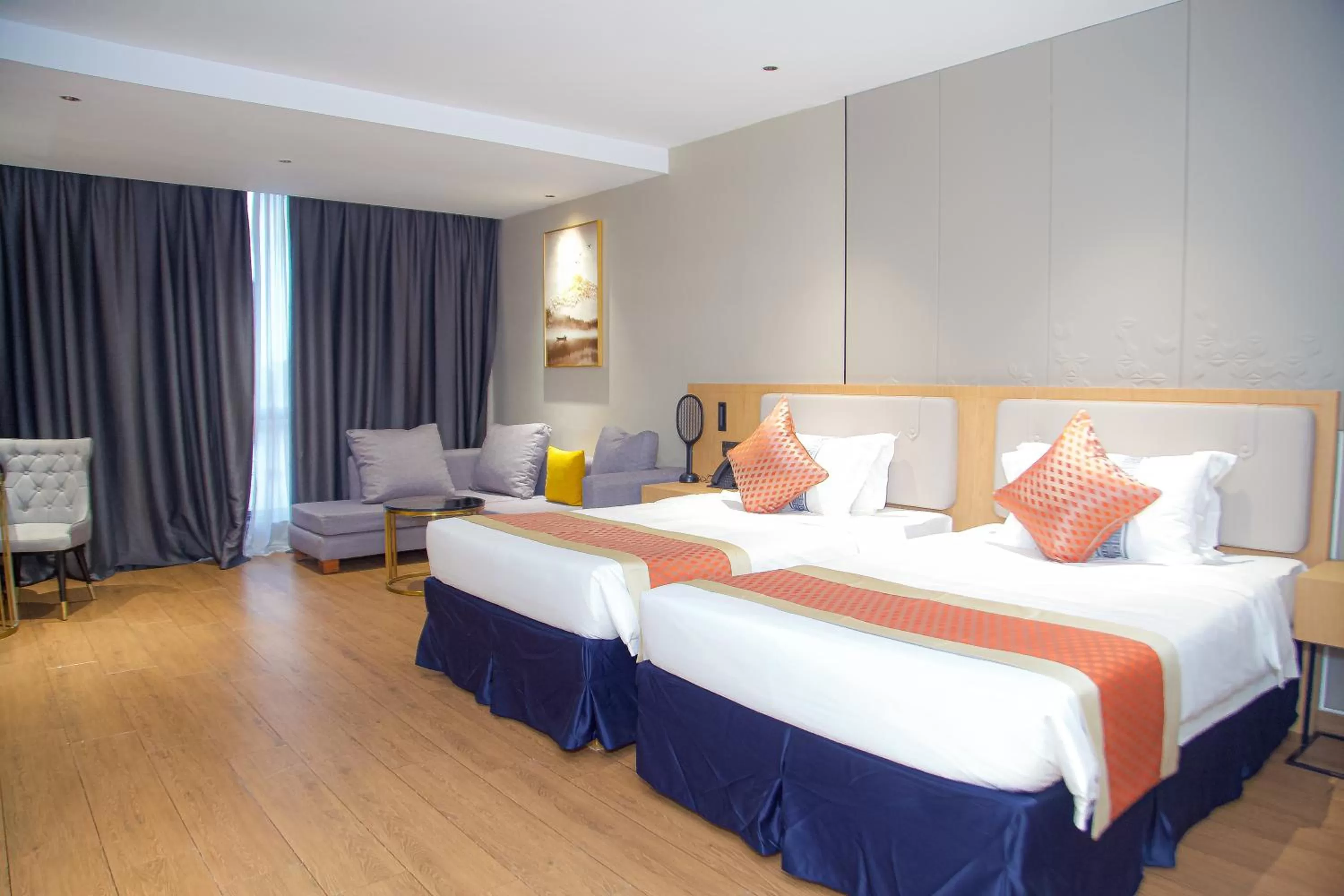 Photo of the whole room in Hôtel FAMILLE MONDIALE