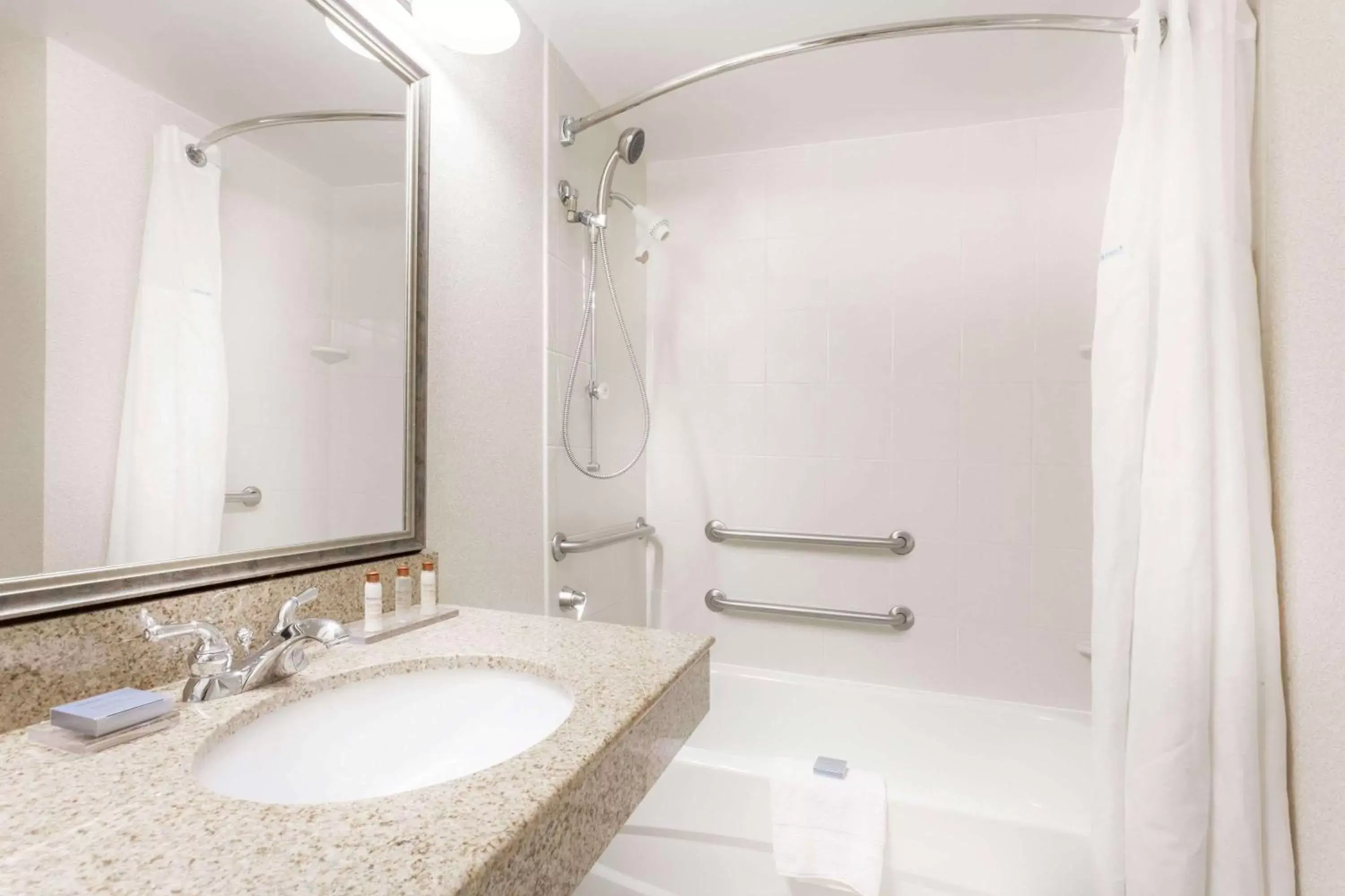 Bathroom in Wingate by Wyndham Columbia/Lexington Bathroom in Wingate by Wyndham Columbia/Lexington