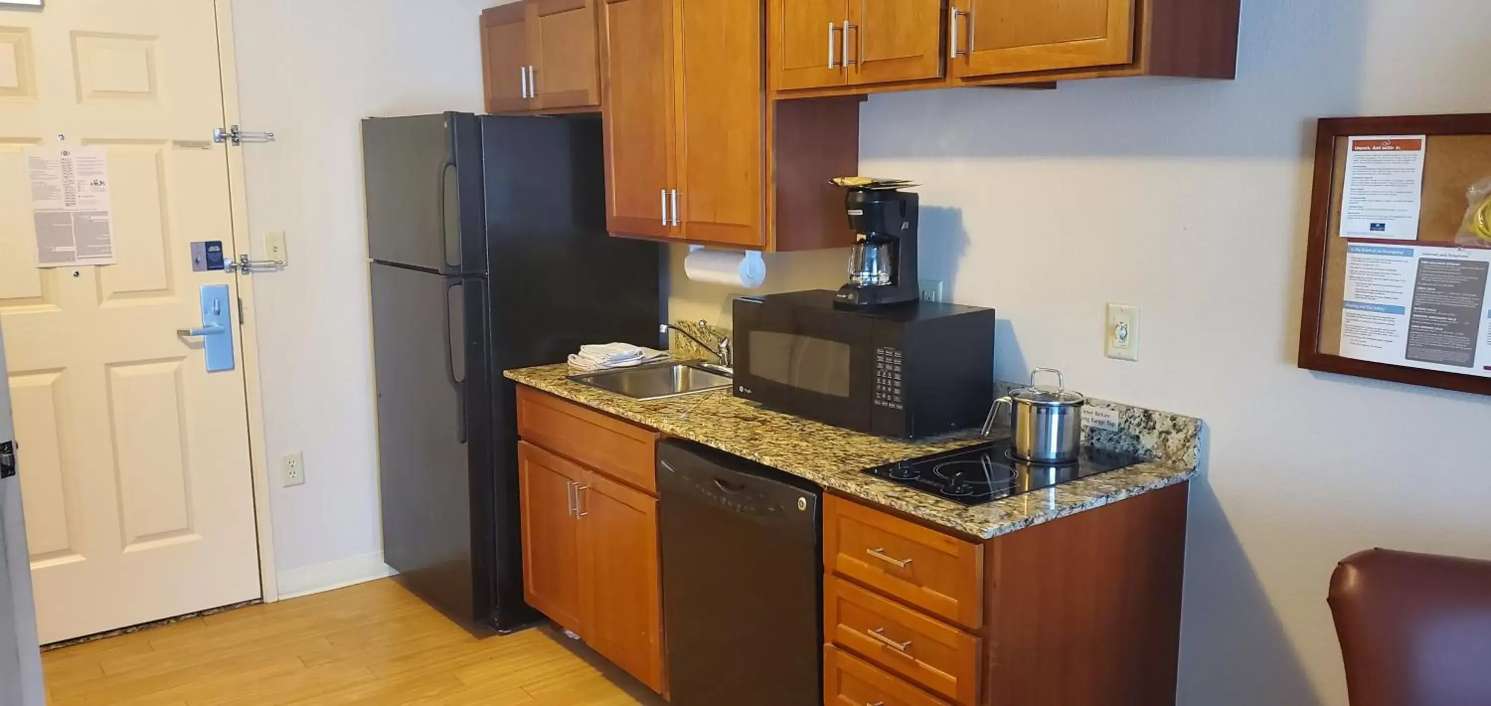 Kitchen or kitchenette, Kitchen/Kitchenette in Candlewood Suites Champaign-Urbana University Area, an IHG Hotel