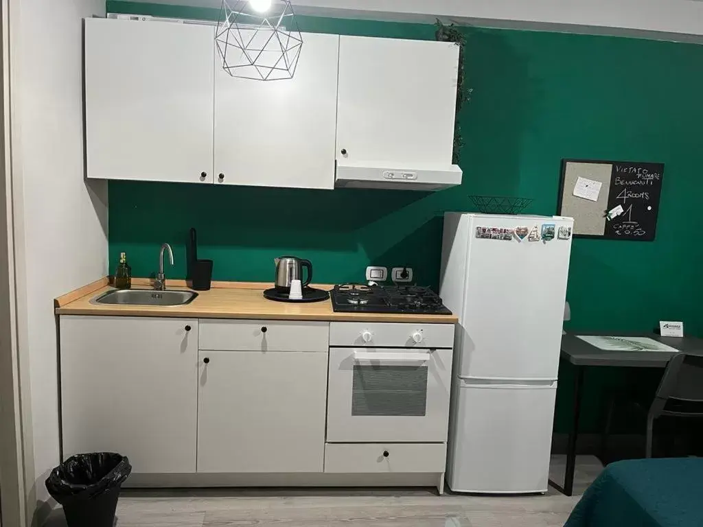 Kitchen/Kitchenette in 4ROOMS b&b - HOLIDAY HOME