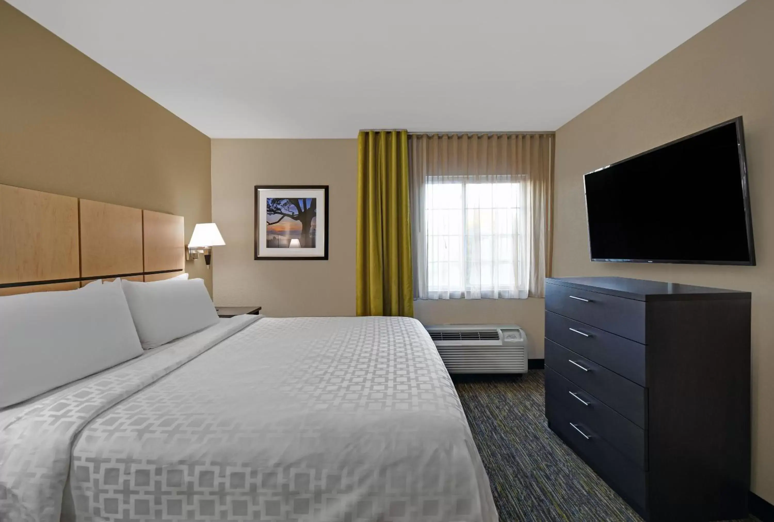 Photo of the whole room, Bed in Candlewood Suites Sumter, an IHG Hotel