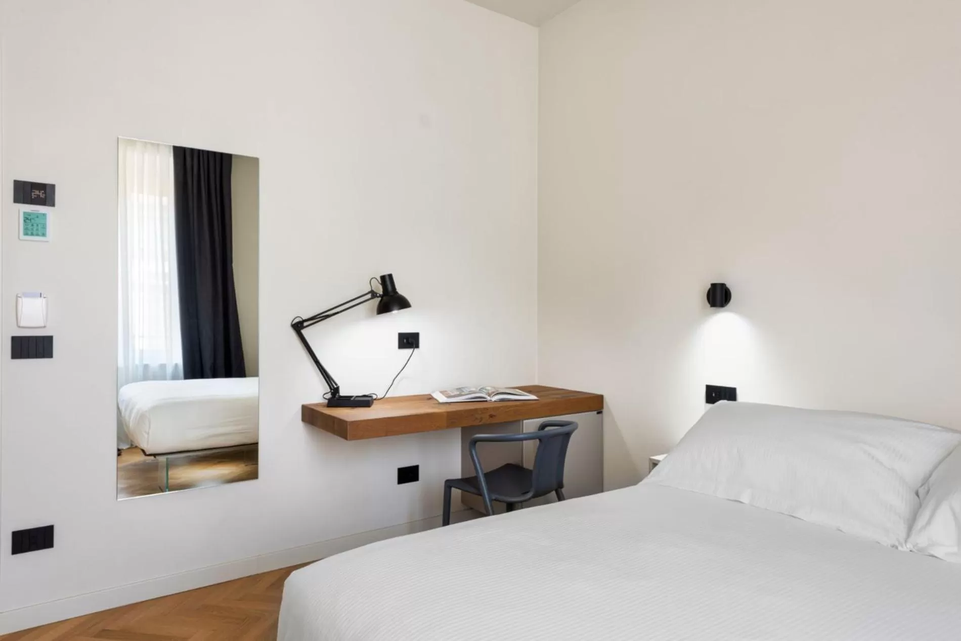 Bed in Villa Fedora Luxury Suites