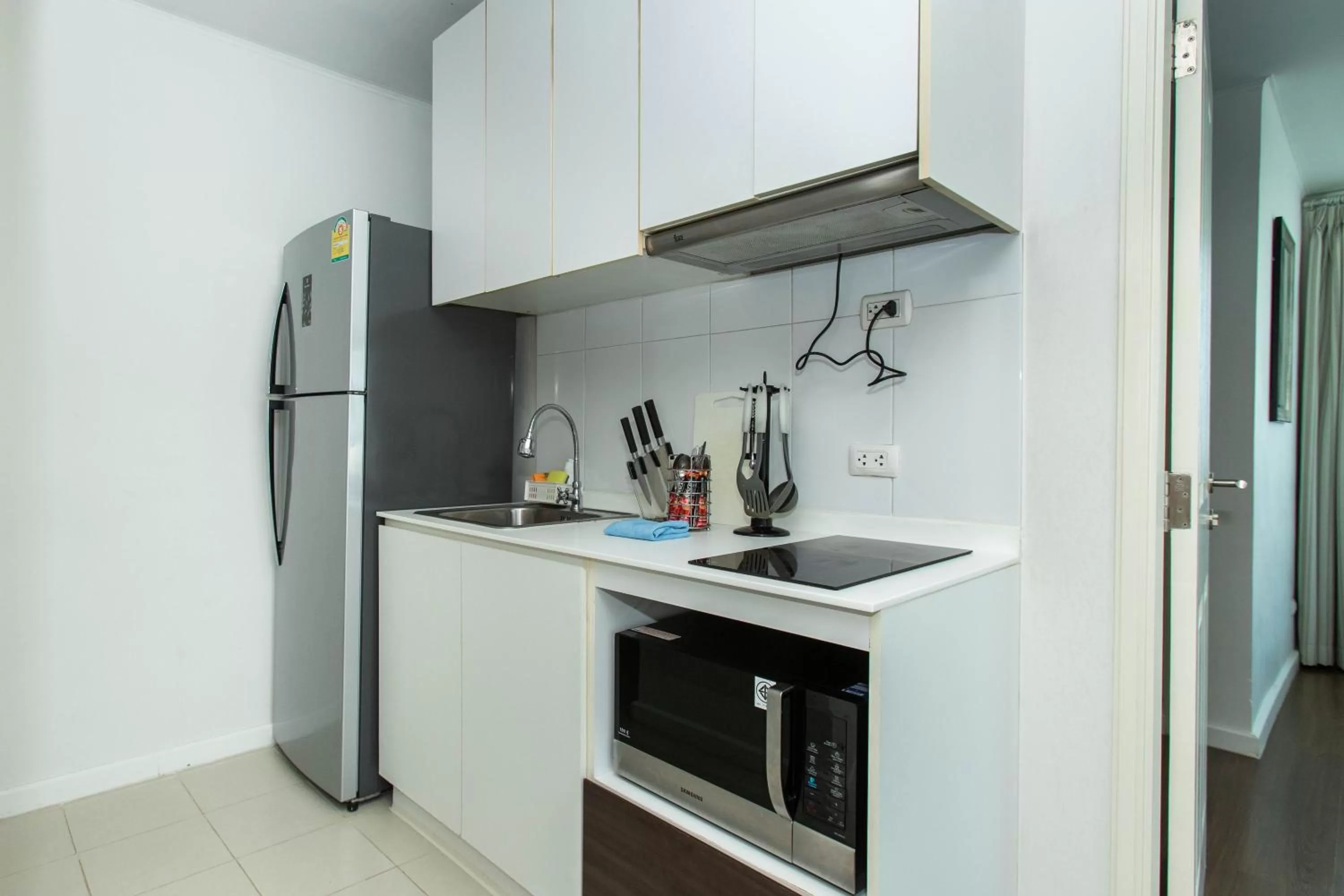 kitchen in First Choice Suites SHA Plus Extra
