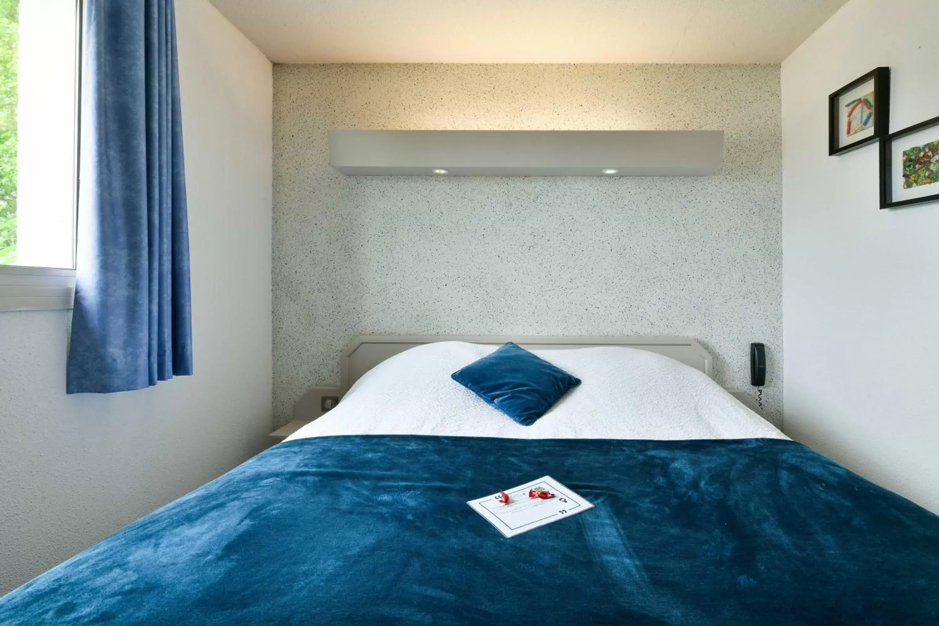 Bedroom, Bed in Logis Hôtel & Restaurant Ludik