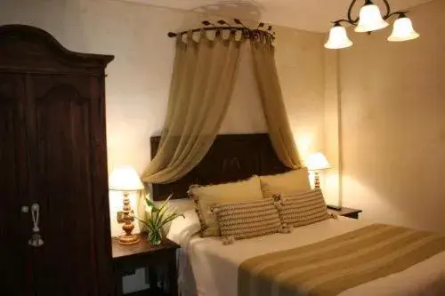 Bed in Hotel Boutique Los Pasos & Spa