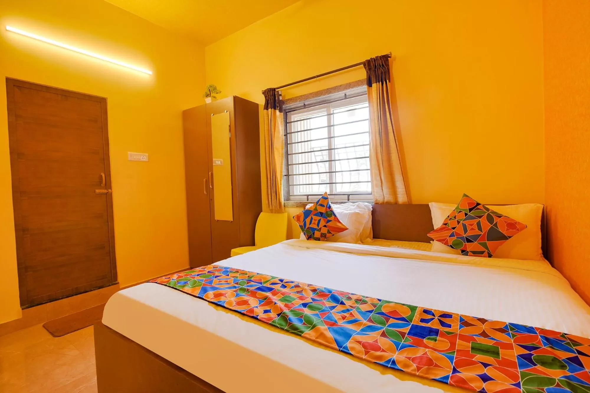 Bed in FabHotel Vijaylakshmi Stay Inn - Nr Chennai International Airport