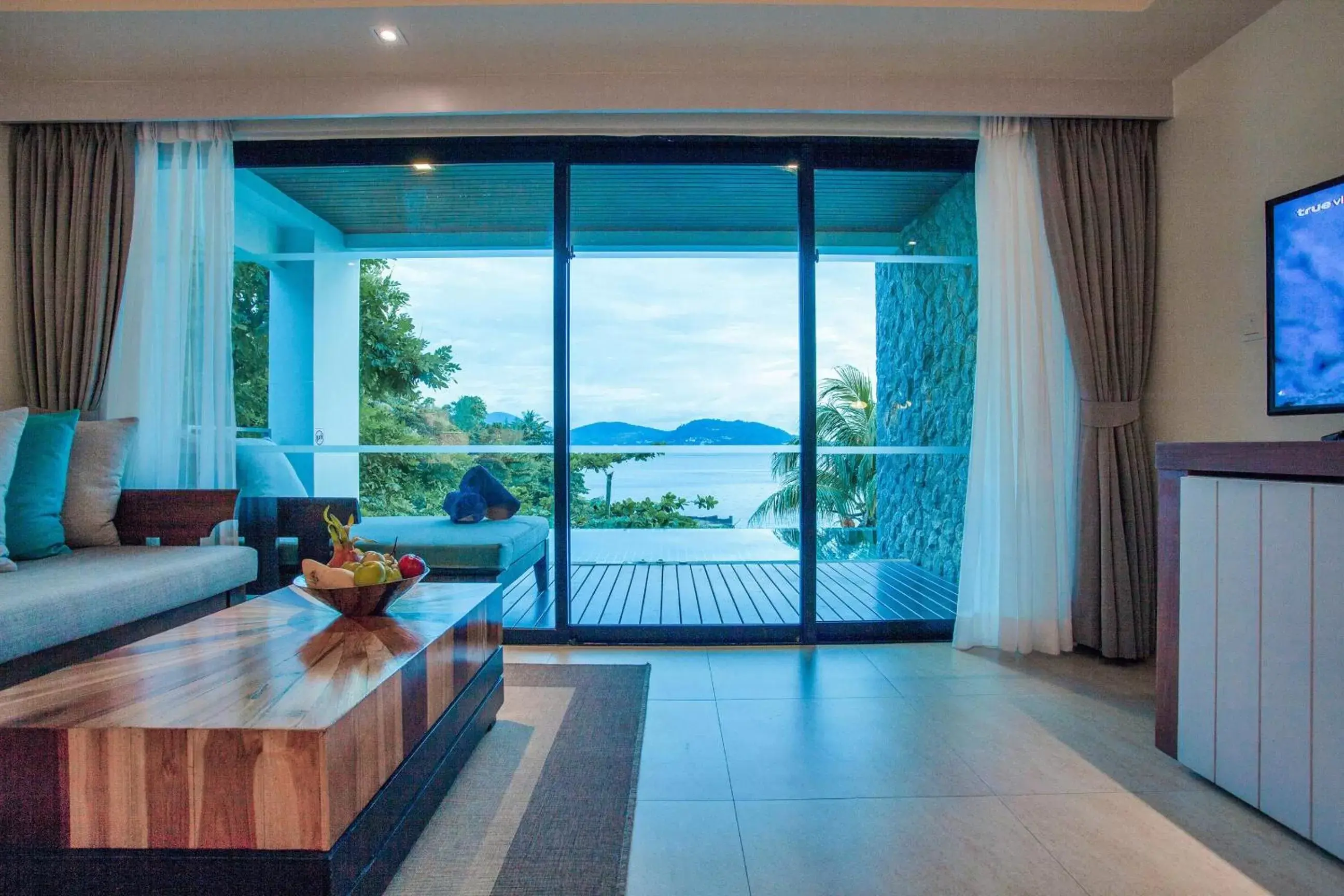 Seating area in Zenmaya Oceanfront Phuket, Trademark Collection by Wyndham