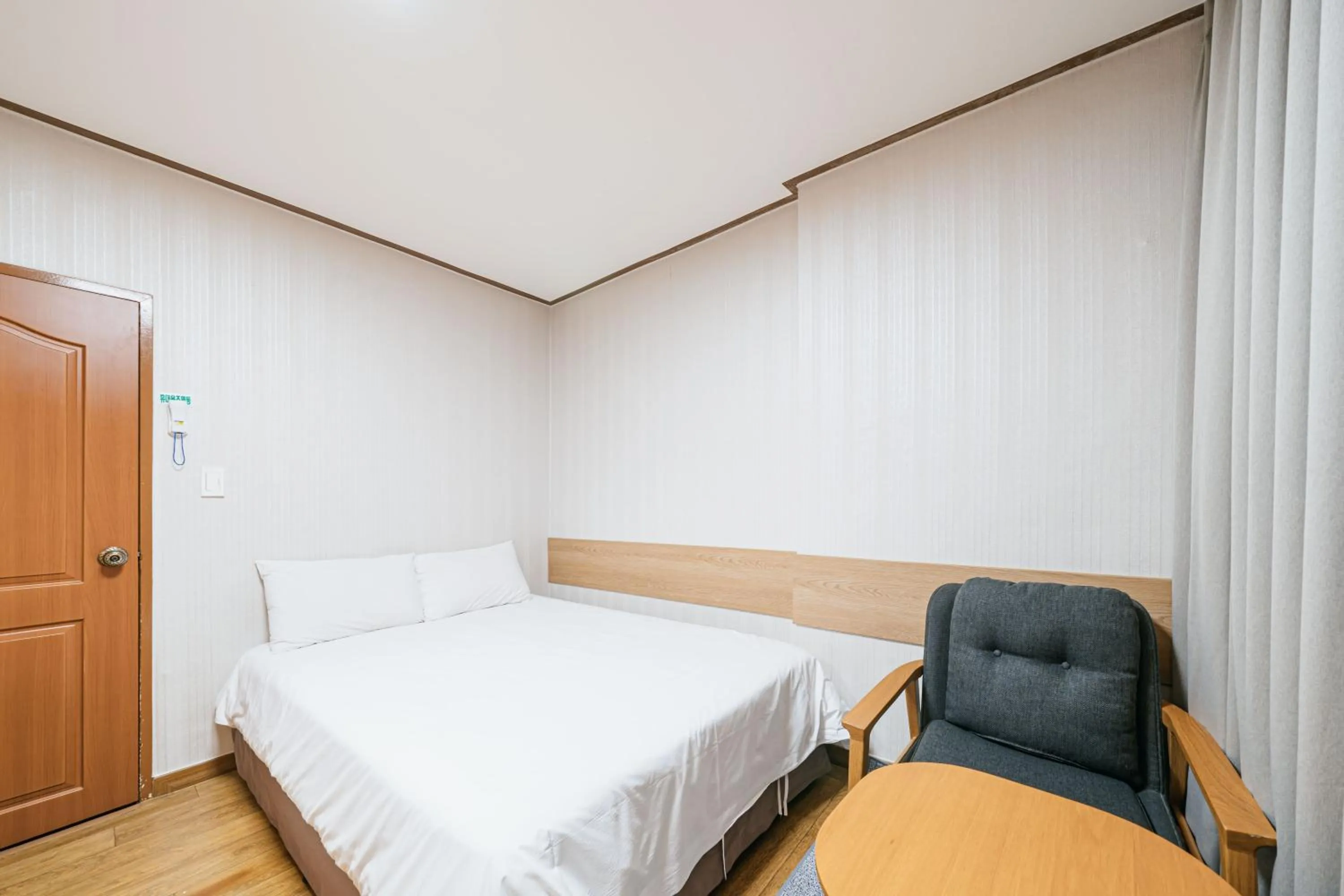 Bed in Jeju Miracle Hotel