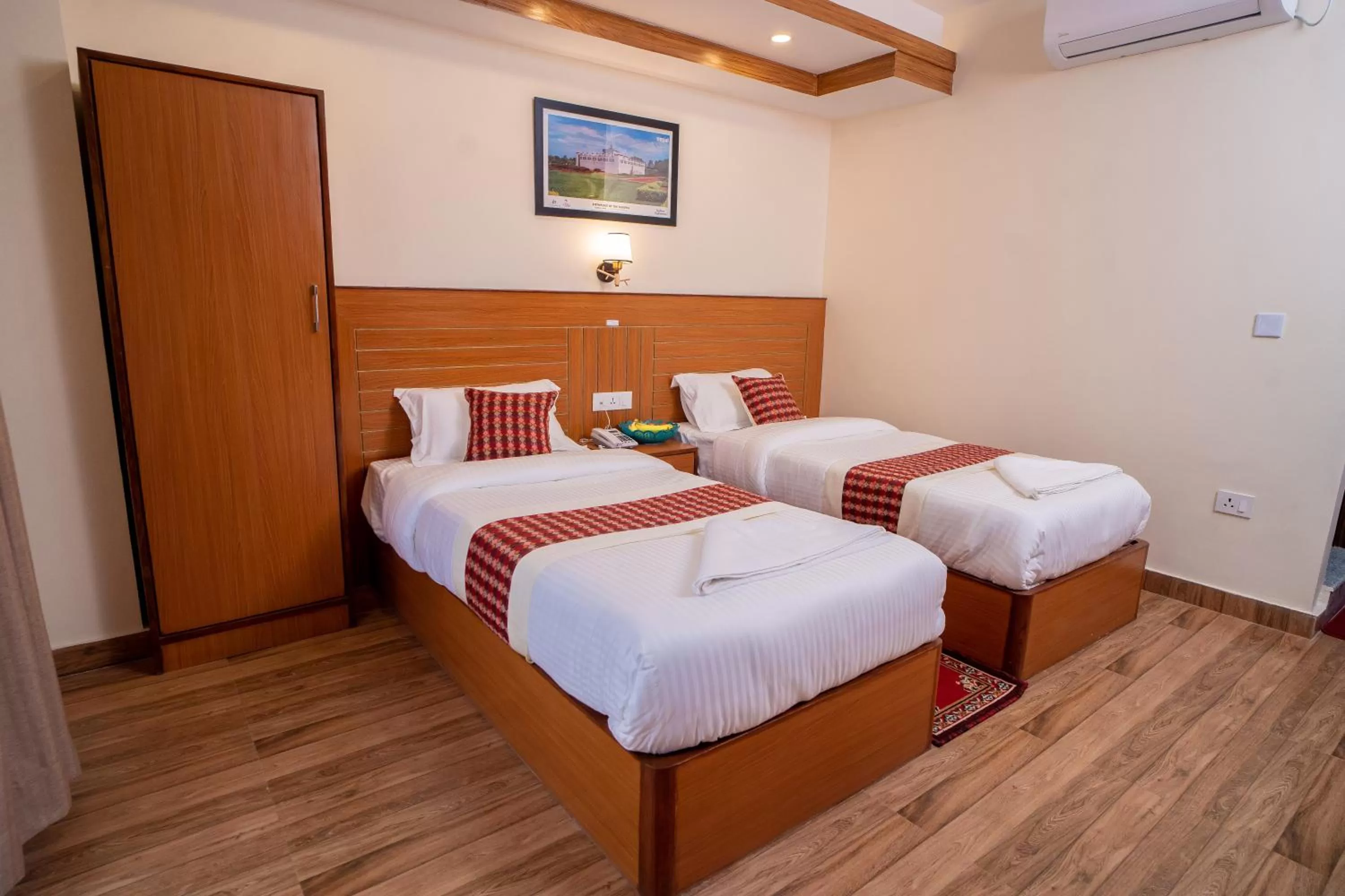 Bed in Madhuban Hotel