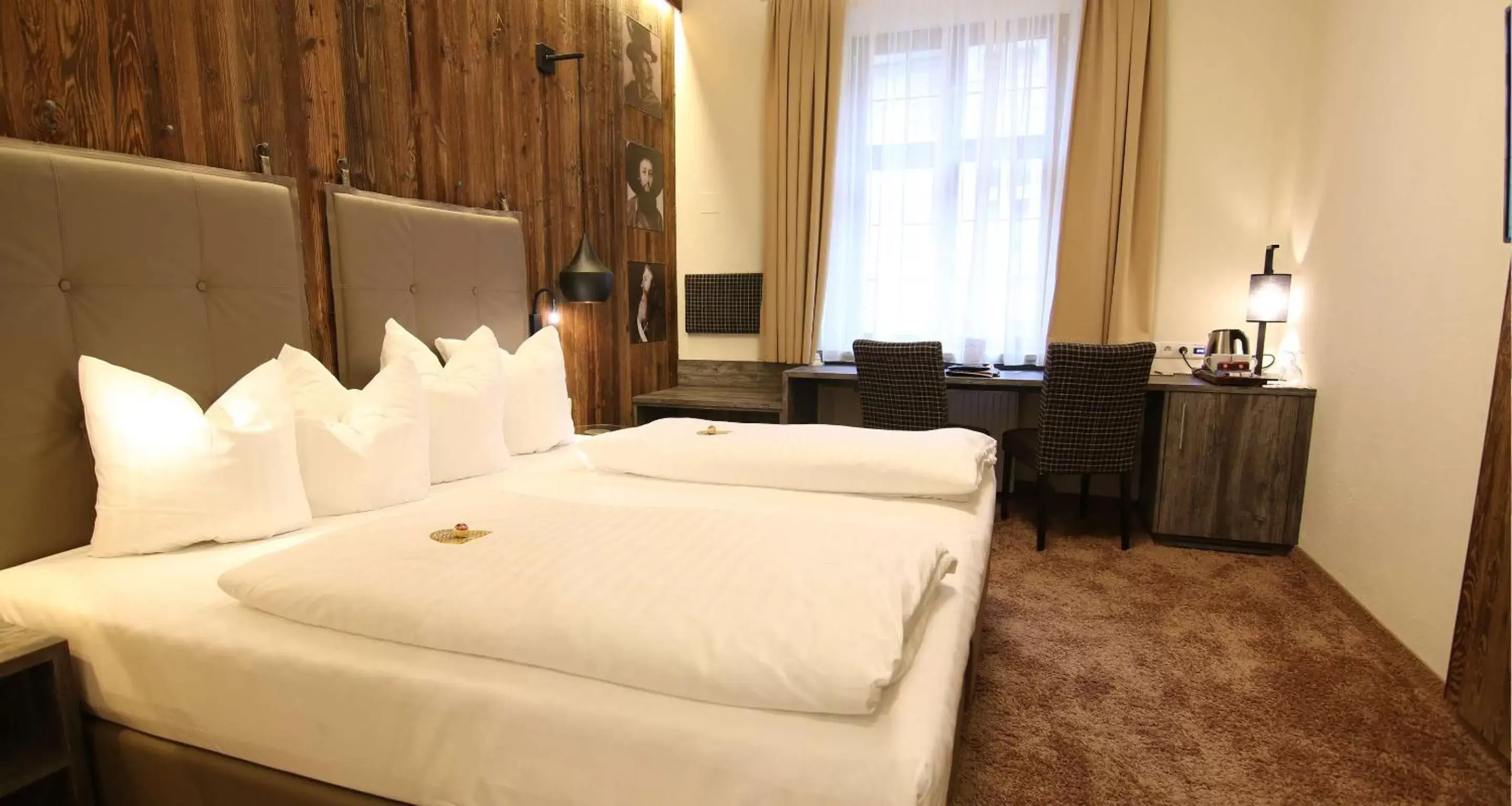 Photo of the whole room, Bed in BEST WESTERN Plus Hotel Goldener Adler Innsbruck