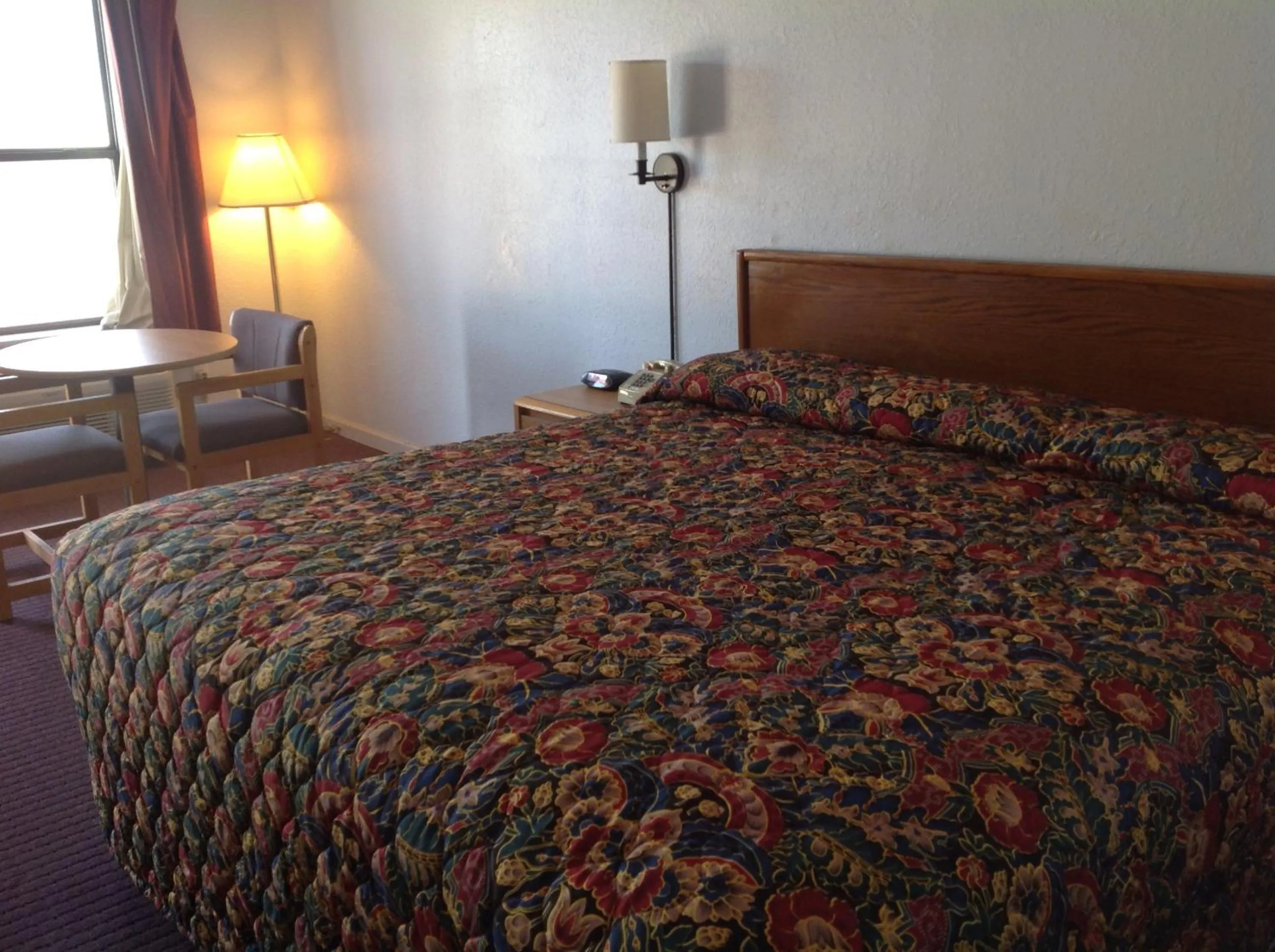Bed in Knights Inn Muskogee