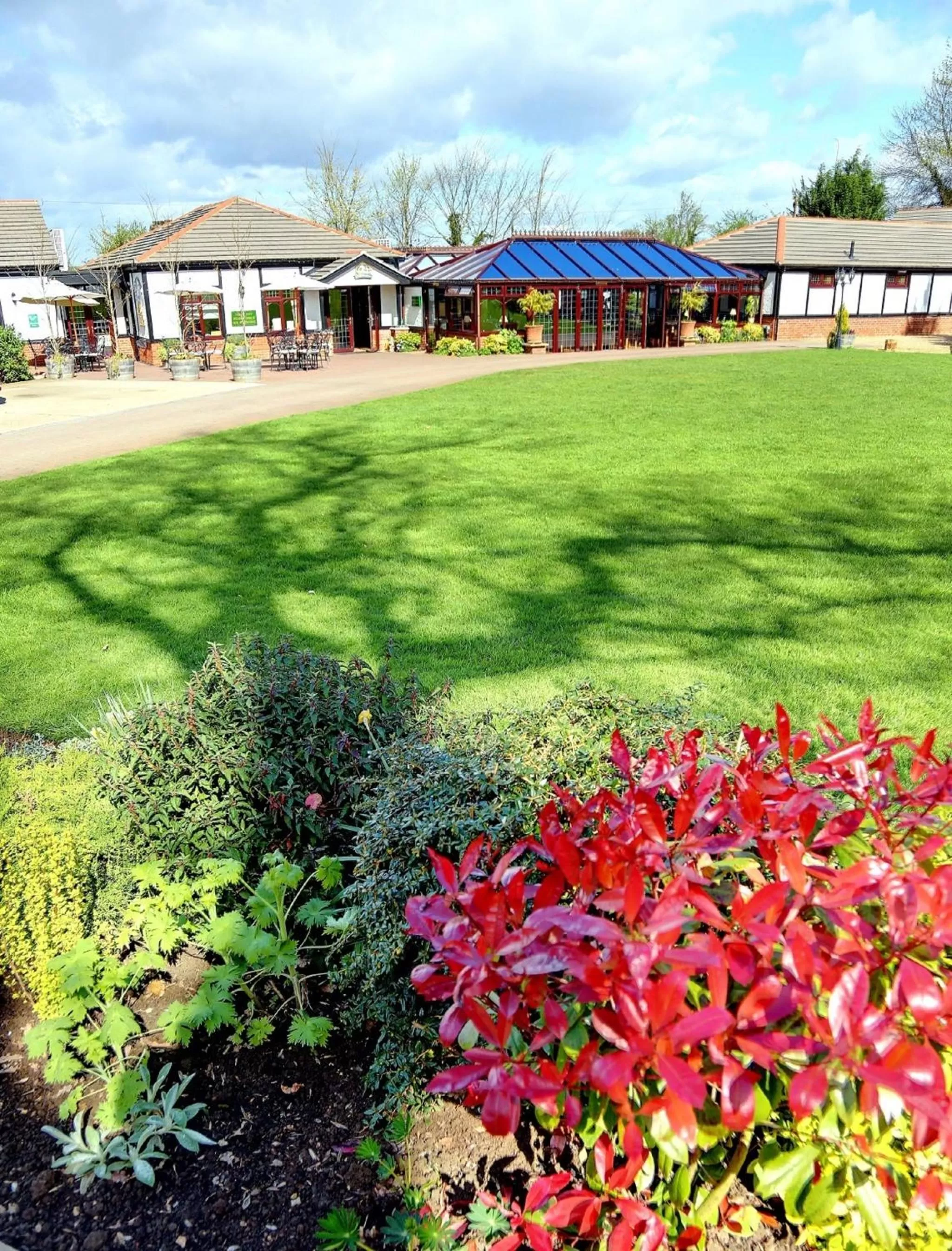 Facade/entrance, Garden in The Stanwick Hotel