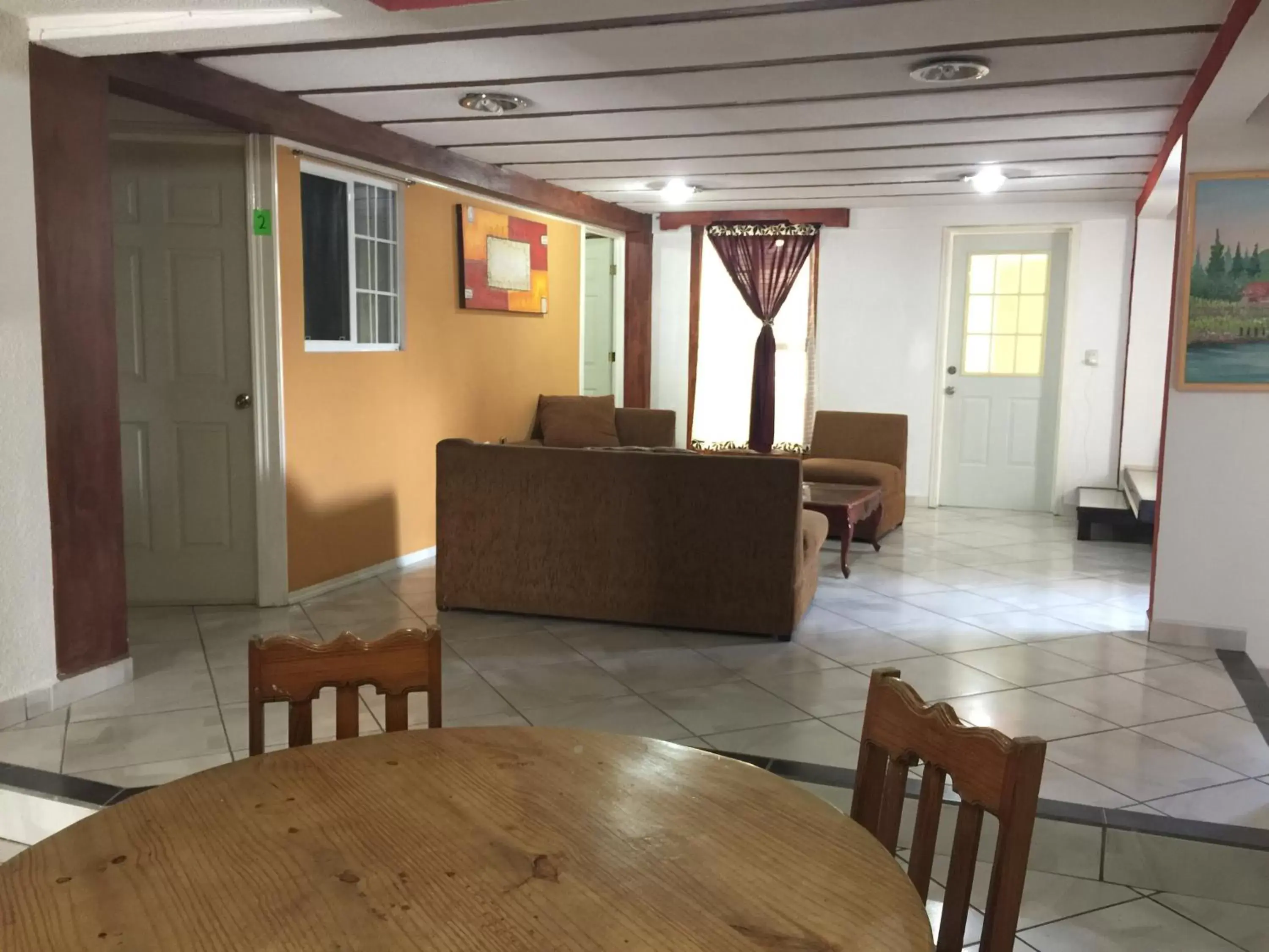 Living room, Seating Area in Hotel & Suites Cerro Roj0