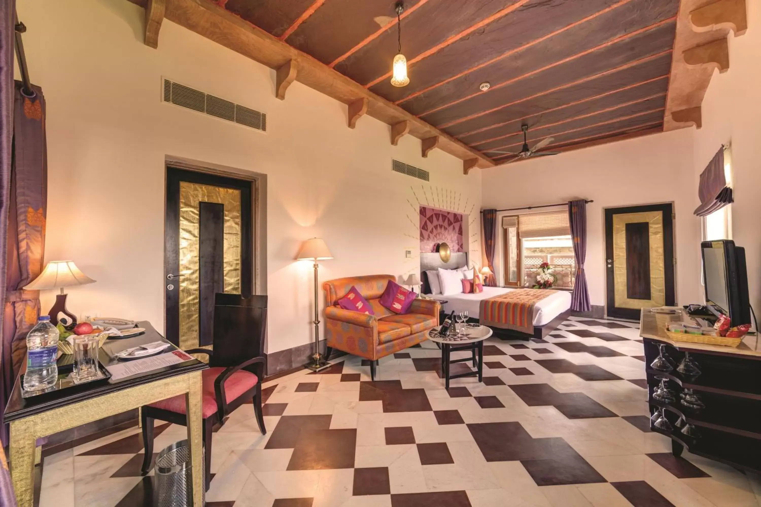 Bedroom, Seating Area in Ramada Udaipur Resort & Spa