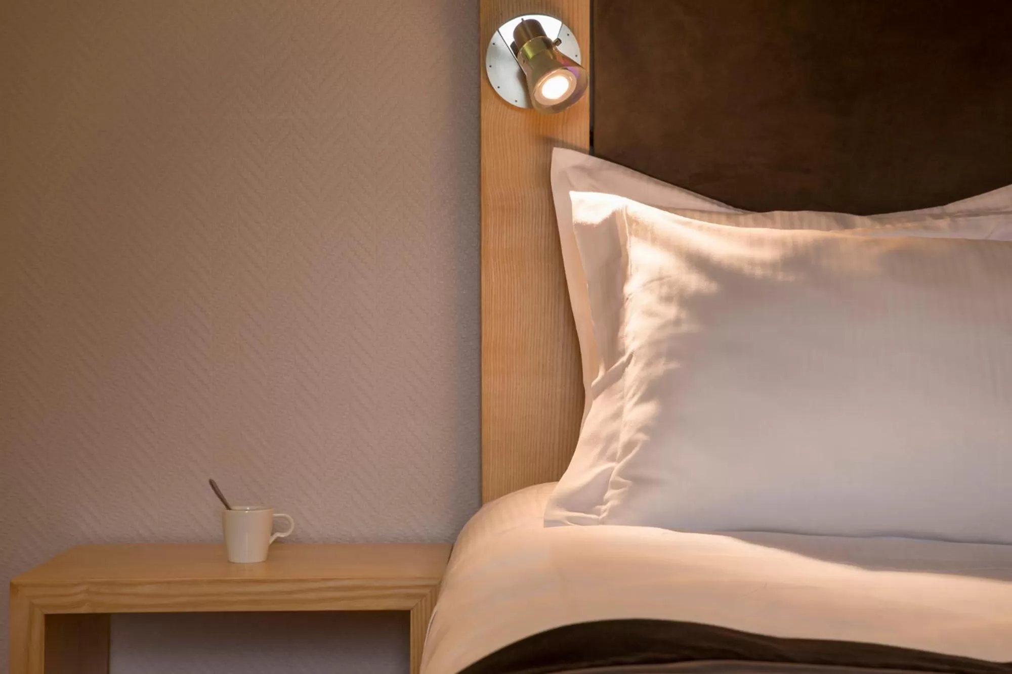 Decorative detail, Bed in The Originals Boutique, Hôtel du Pont Roupt, Mende